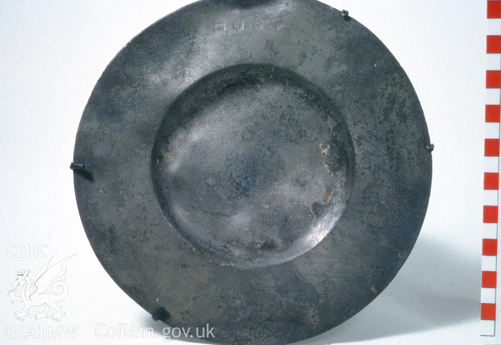 Colour slide showing find from site, pewter plate, from a survey of the Mary designated shipwreck, courtesy of National Museums, Liverpool (Merseyside Maritime Museum)