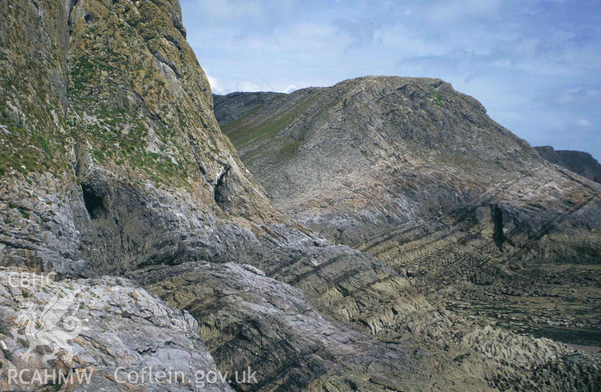 Goat's Hole and Hound's Hole Caves, Paviland; colour slide showing view from the south-west, taken by David Leighton, 1997.