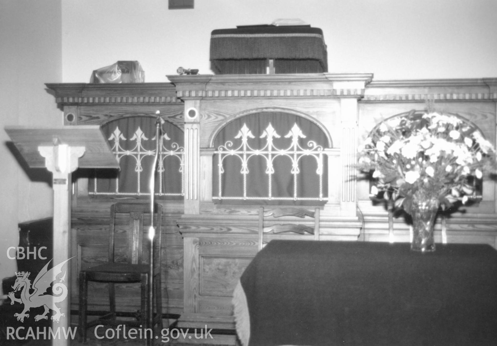 Digital copy of a black and white photograph showing an interior view of Hill Park Baptist Chapel, Haverfordwest, taken by Robert Scourfield, c.1996.