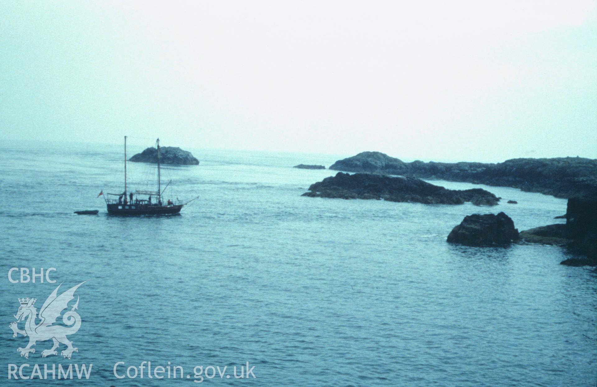 Colour slide of a general view of the Skerries in the vicinity of the wreck site, showing sailing vessel, from a survey of the Mary designated shipwreck, courtesy of National Museums, Liverpool (Merseyside Maritime Museum)