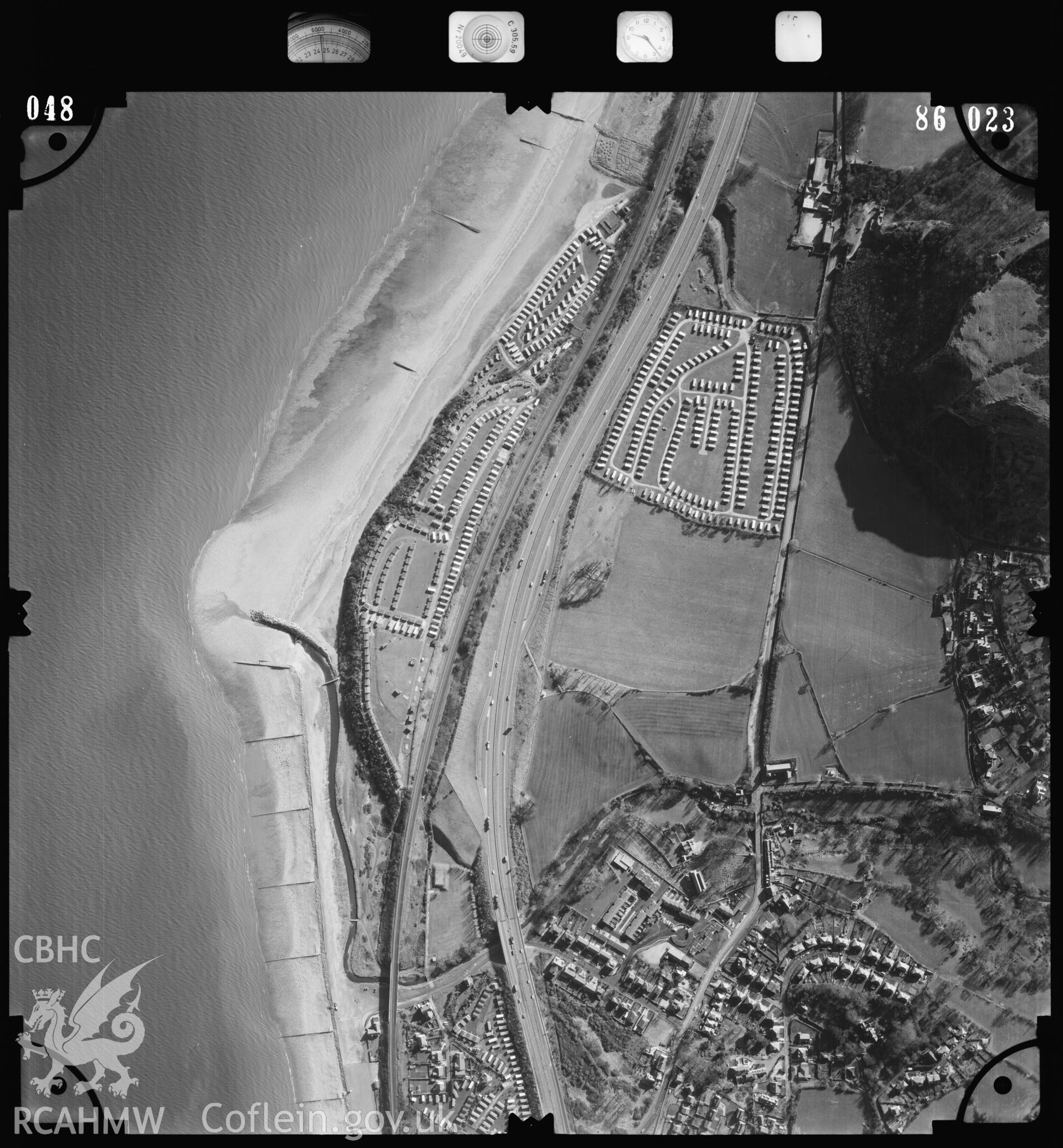 Digitized copy of an aerial photograph showing Dulas Railway Viaduct and surrounding area, taken by Ordnance Survey, 1986.