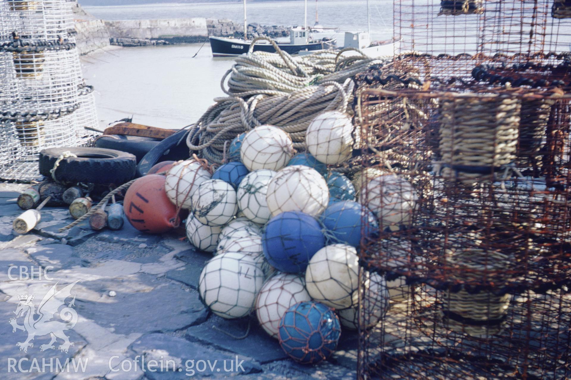 Colour 35mm slide showing lobster pots at New Quay Harbour, Ceredigion, by Dylan Roberts.