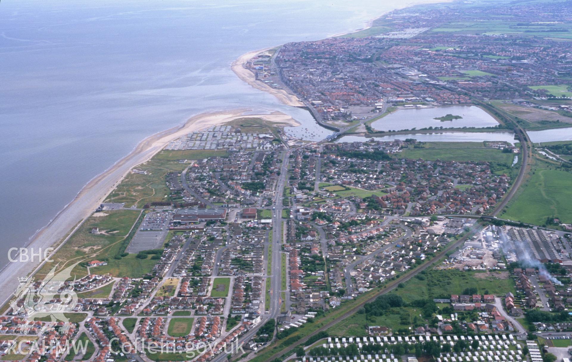 Slide of RCAHMW colour oblique aerial photograph of the coastline from Kinmel Bay to Rhyl taken by T.G. Driver, 2001.