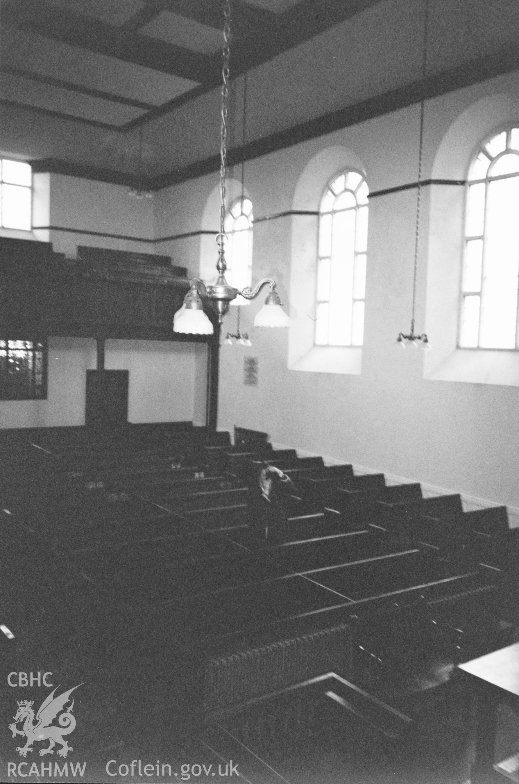Digital copy of a black and white photograph showing an interior view of Henllan Amgoed Congregational Chapel,  taken by Robert Scourfield, 1996.