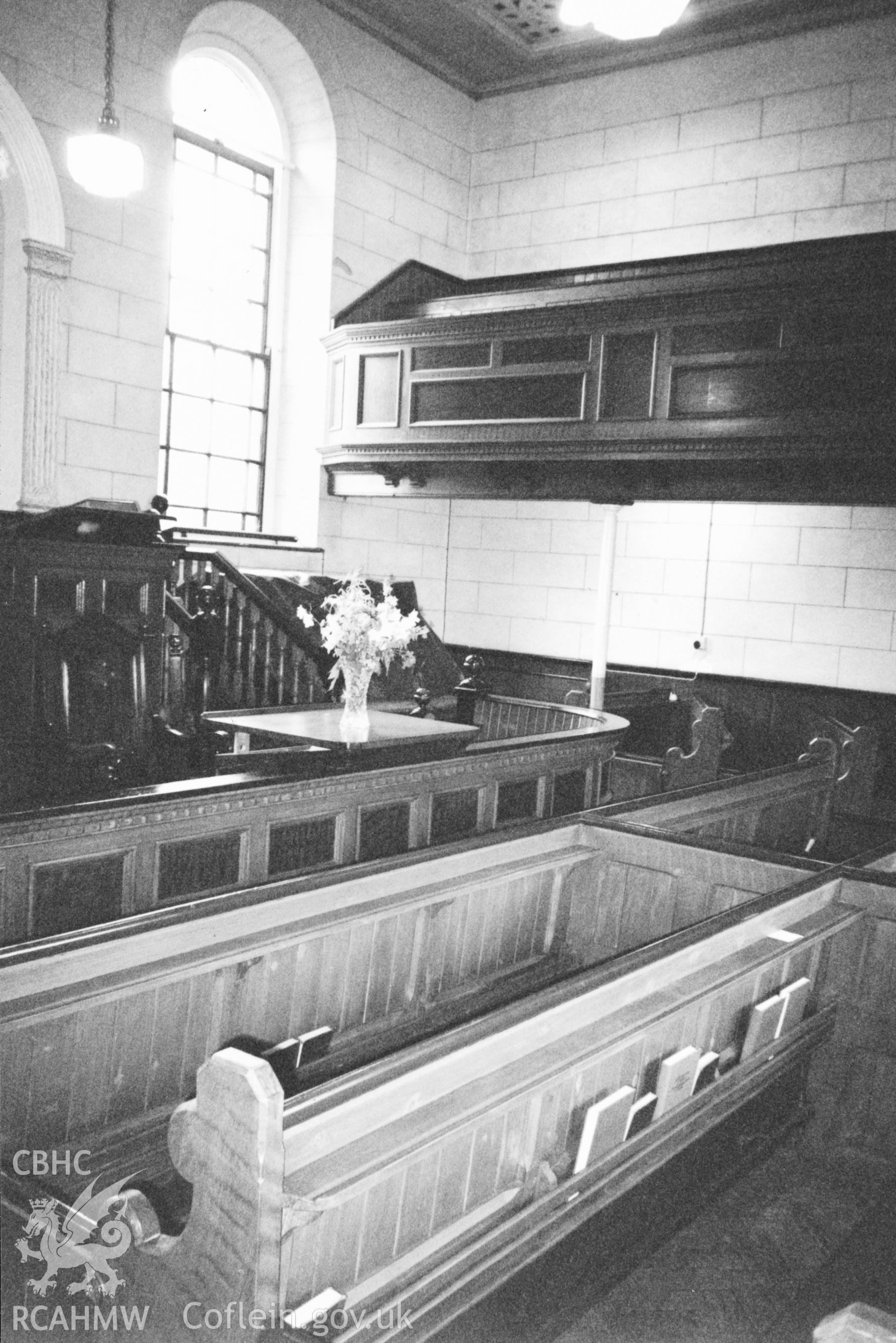 Digital copy of a black and white photograph showing an interior view of Tabernacl Welsh Calvinistic Methodist Chapel, Llanddowror, taken by Robert Scourfield, 1996.