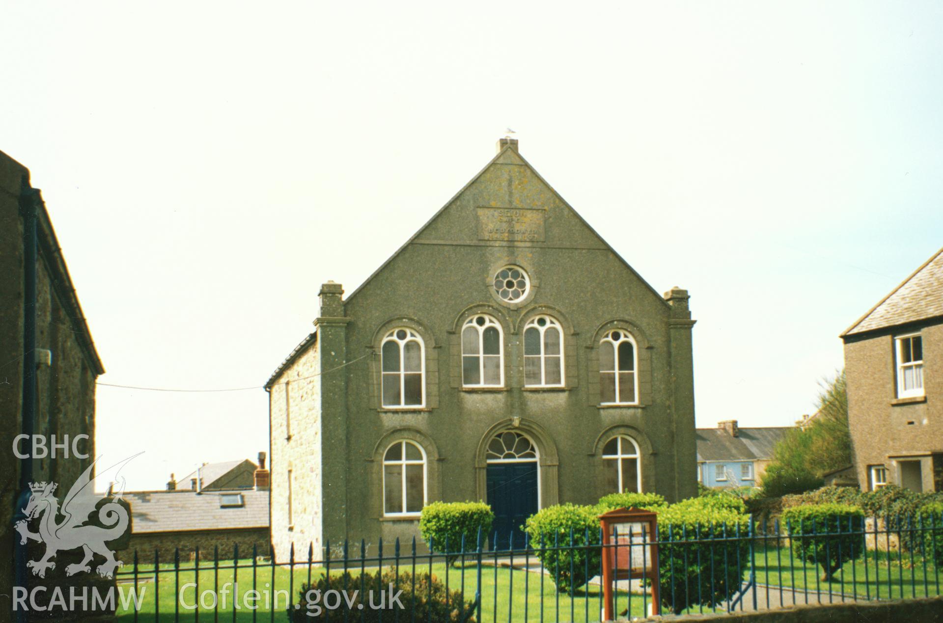 Digital copy of a colour photograph showing an exterior view of Seion Welsh Baptist Chapel, St David's,  taken by Robert Scourfield, 1995.