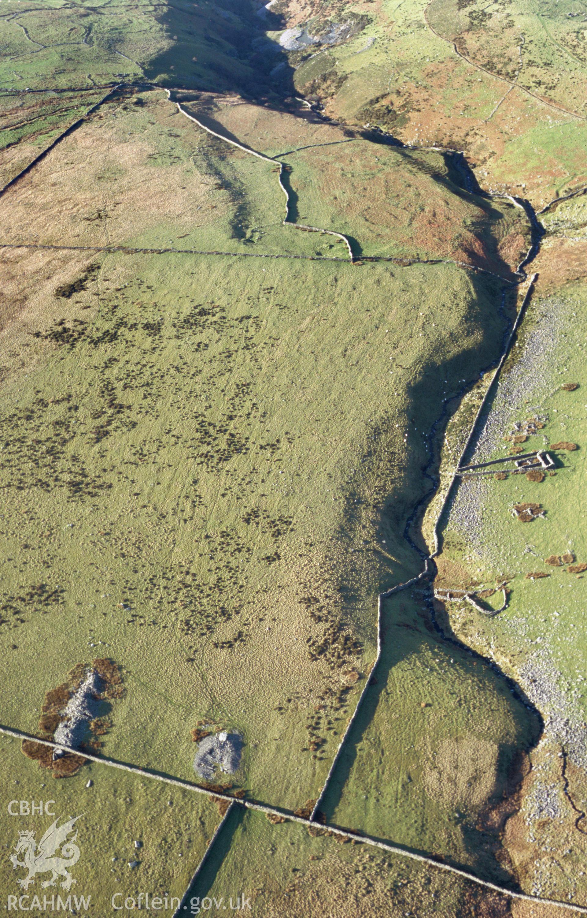 Slide of RCAHMW colour oblique aerial photograph of the north cairn at Carneddau Hengwm, Dyffryn Ardudwy, taken by T.G. Driver, 2005.