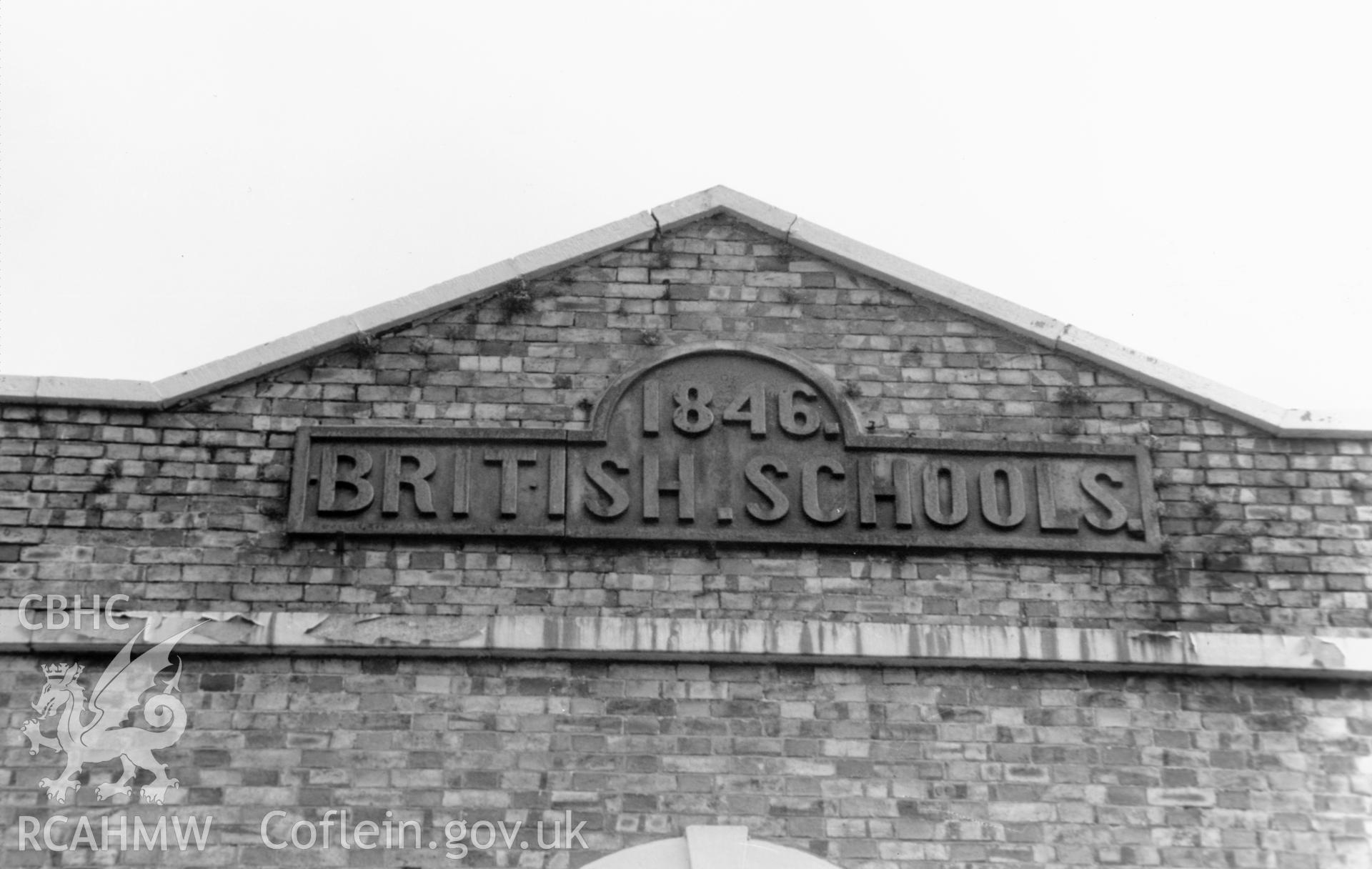 Large black and white photograph showing cast iron 1846 plaque on the former British School, Llangollen, produced by Malcolm Seaborne, May 1989.