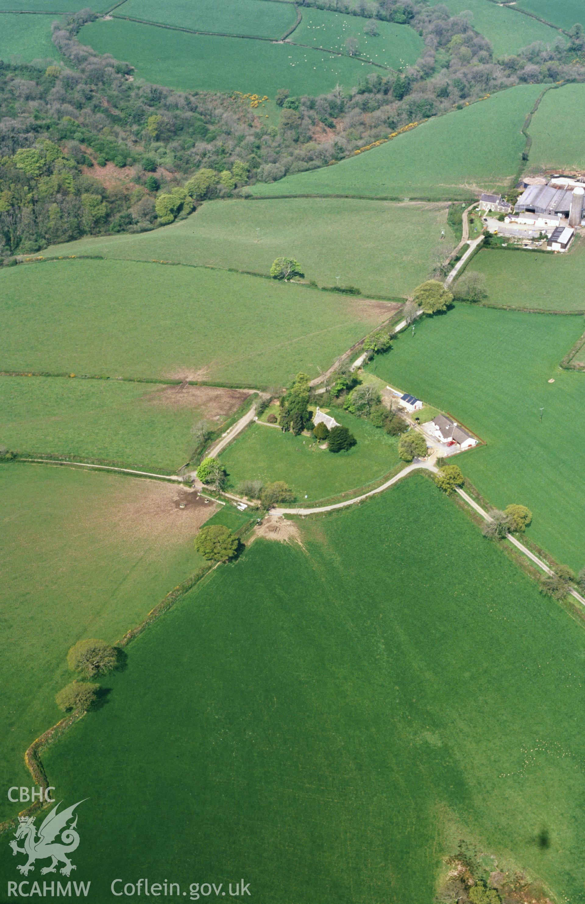 RCAHMW colour slide oblique aerial photograph of Henllan farm [St David's Church], Henllanfallteg, taken by T.G.Driver on the 02/05/2000