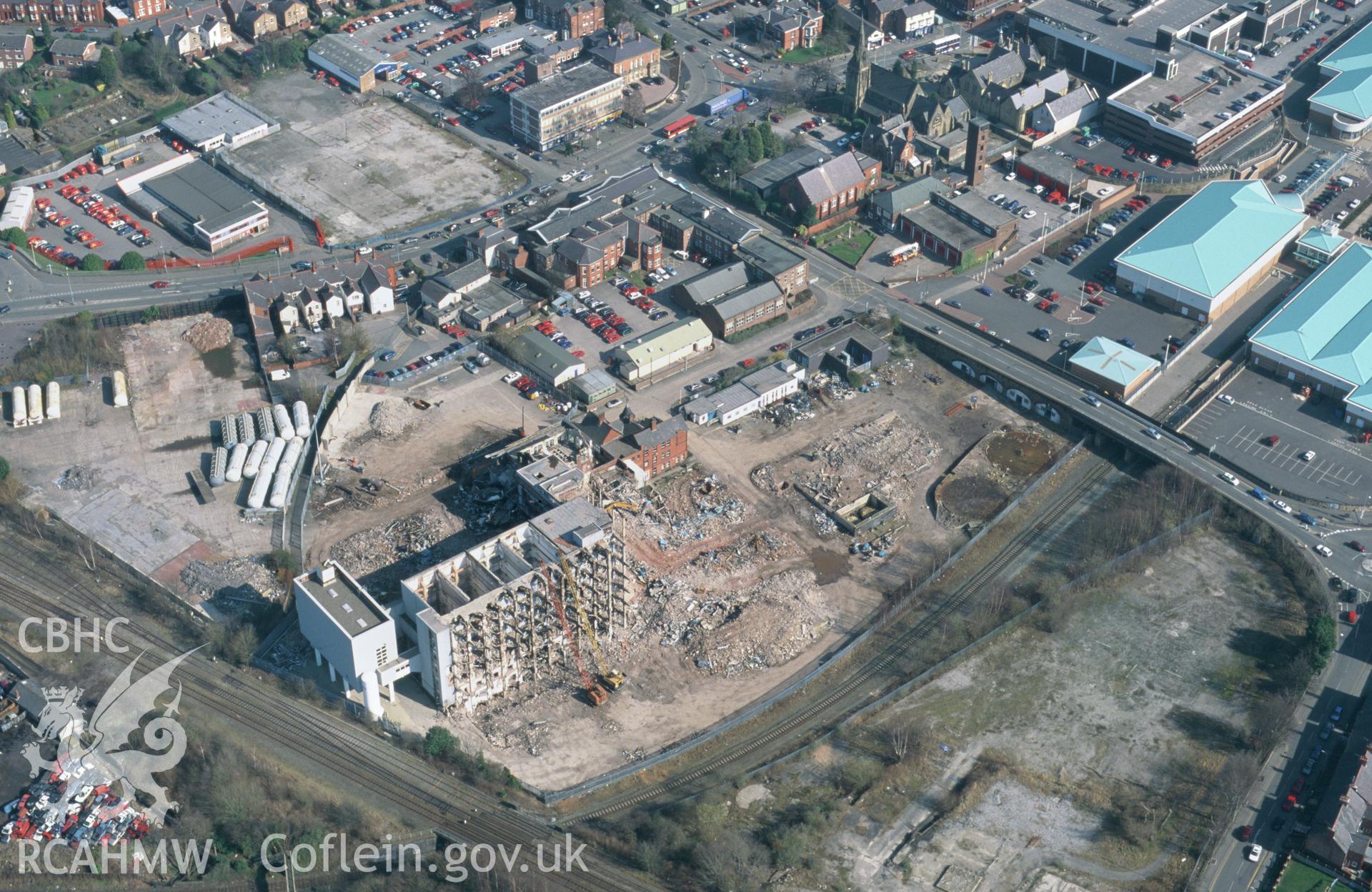 RCAHMW colour oblique aerial photograph of Wrexham Lager Brewery, during final stages of demolition. Taken by Toby Driver on 14/03/2003