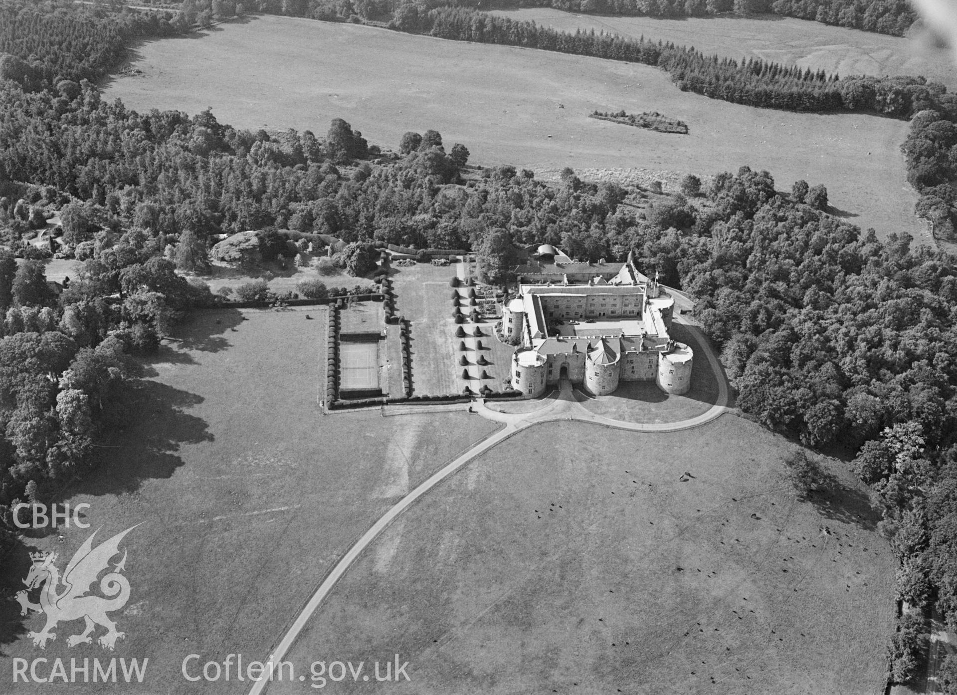 RCAHMW black and white oblique aerial photograph of Chirk Castle, taken by C R Musson, 04/08/1996.