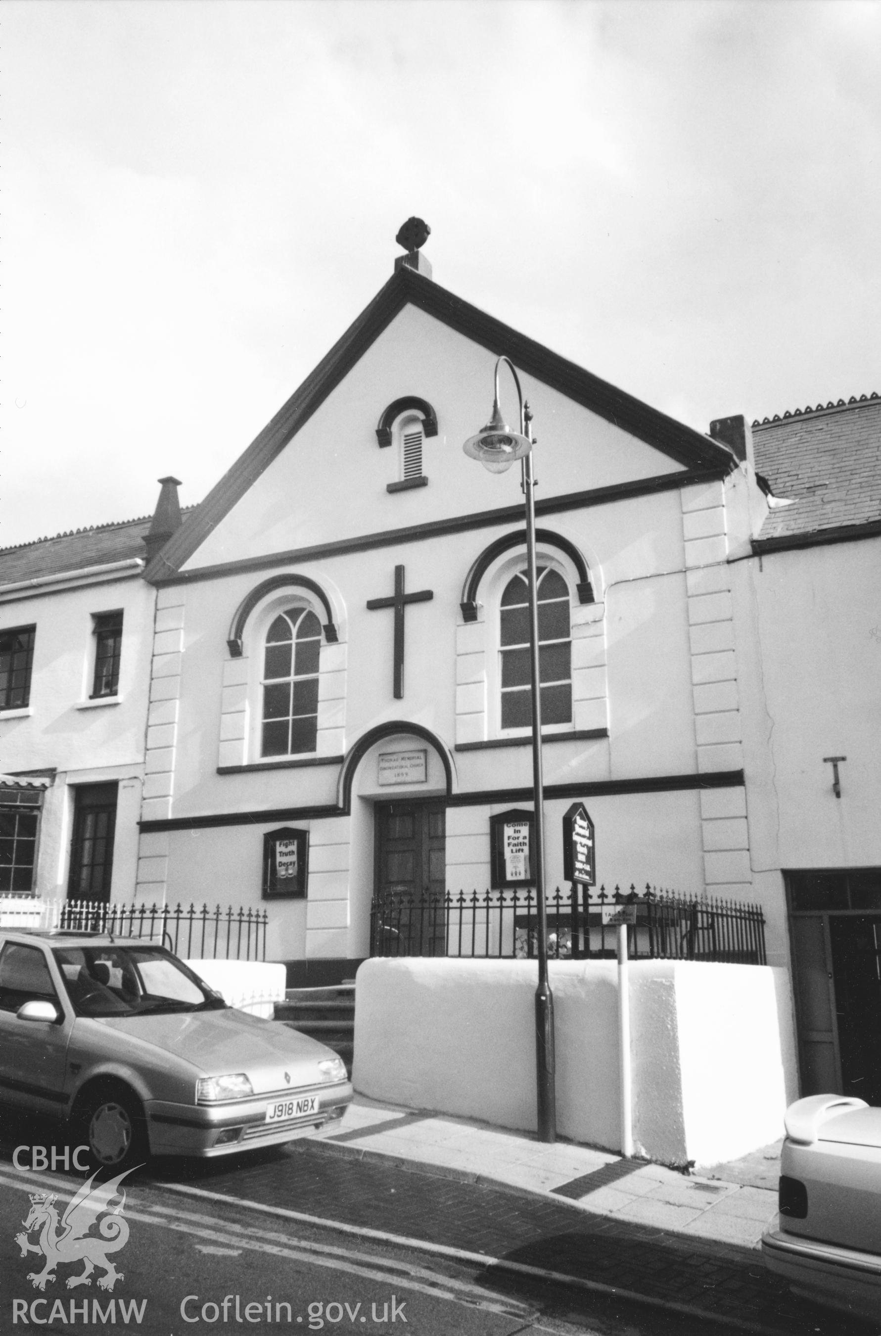 Digital copy of a black and white photograph showing an exterior view of Thomas Memorial Congregational Chapel, Saundersfoot taken by Robert Scourfield, 1996.
