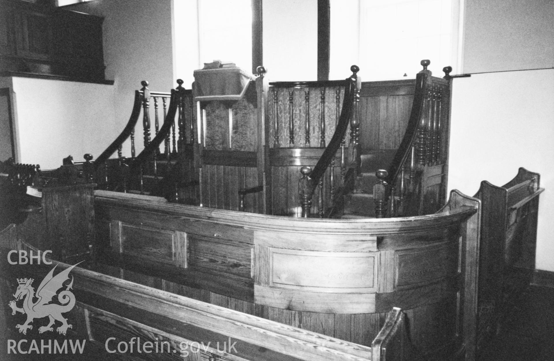 Digital copy of a black and white photograph showing an interior view of Capel y Graig Welsh Calvinistic Methodist Chapel, Cwmbach, taken by Robert Scourfield, 1996.