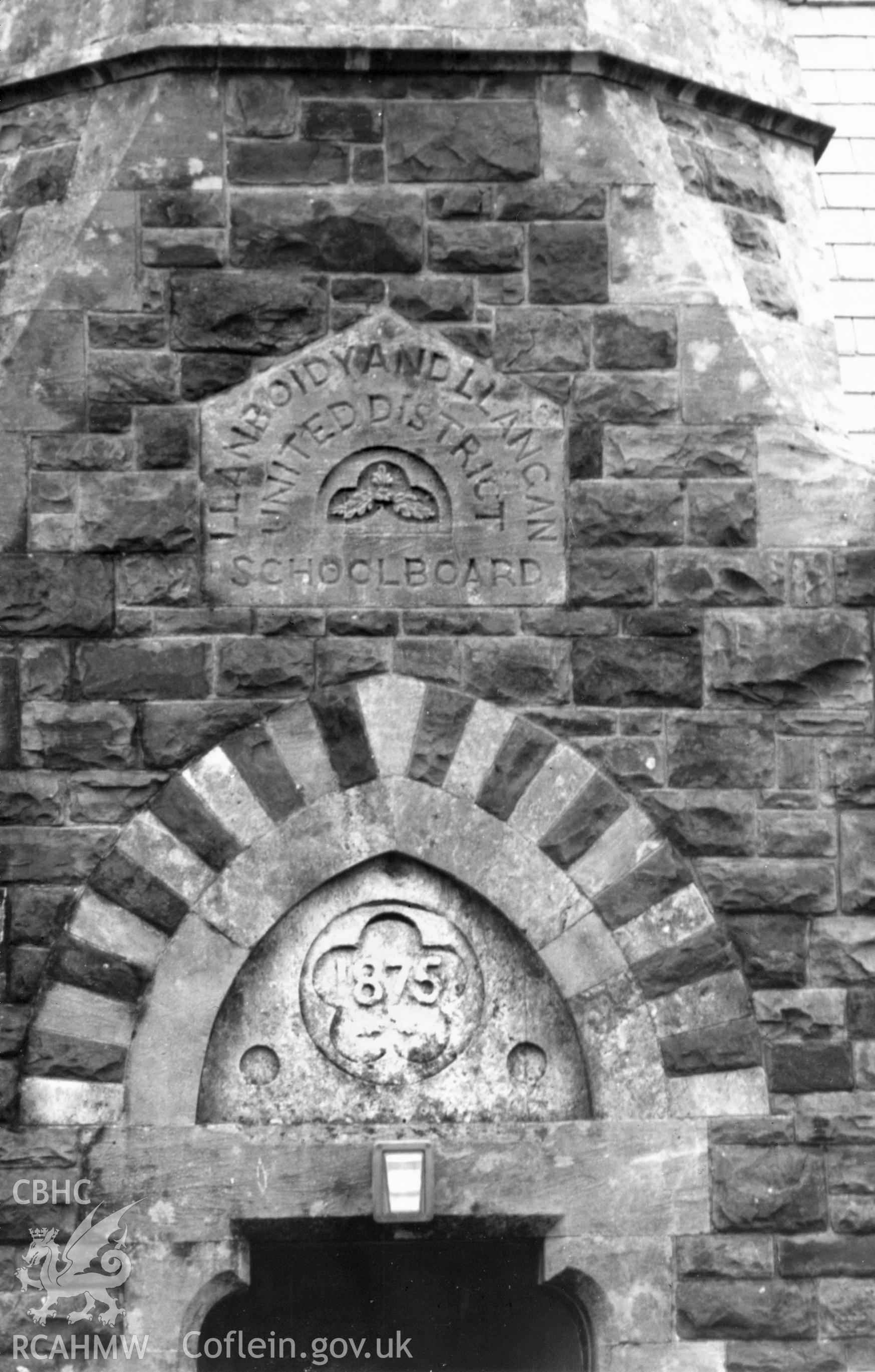 Black and white photograph showing the plaque on Whitland Board School, produced by Malcolm Seaborne, September 1989.