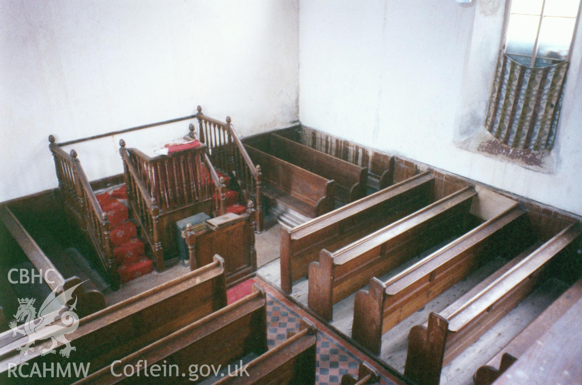 Digital copy of a black and white photograph showing an interior view of Soar Welsh Independent Sunday School, Whitland taken by Robert Scourfield, c.1996.