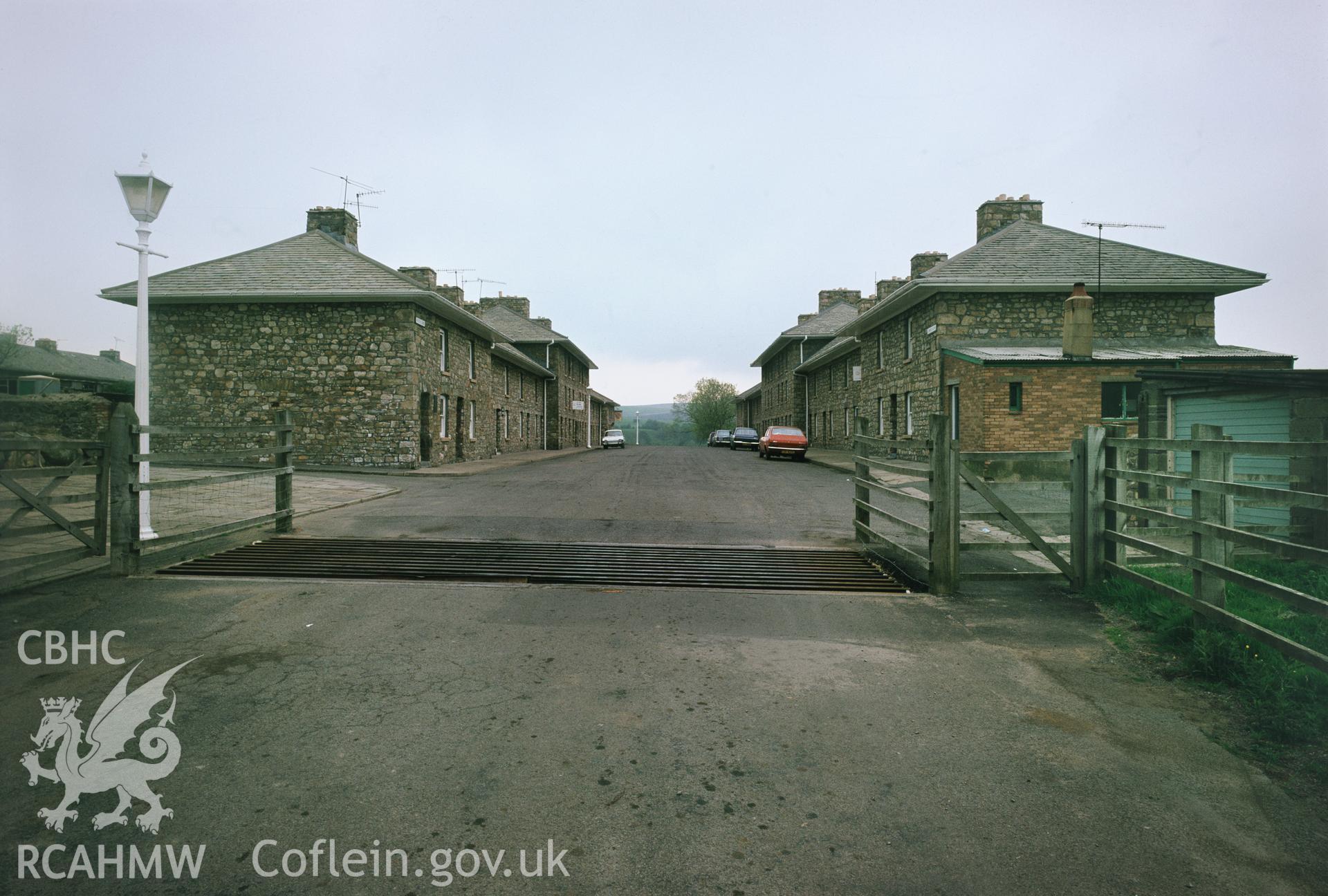 RCAHMW colour transparency showing exterior view of housing in Butetown, Rhymney taken by I.N. Wright, 1979