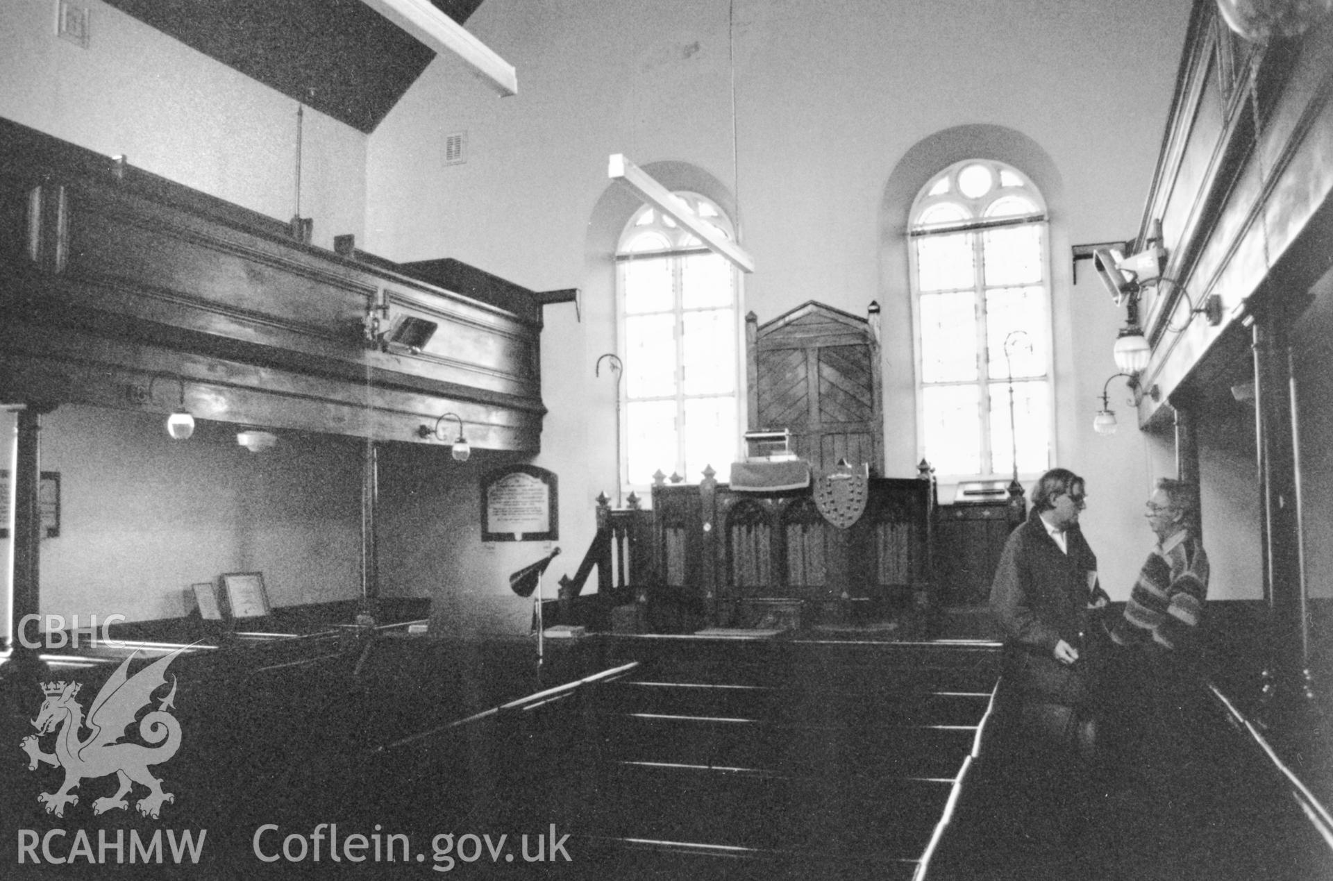 Digital copy of a black and white photograph showing an interior view of Seion Welsh Baptist Chapel, St David's,  taken by Robert Scourfield, 1995.