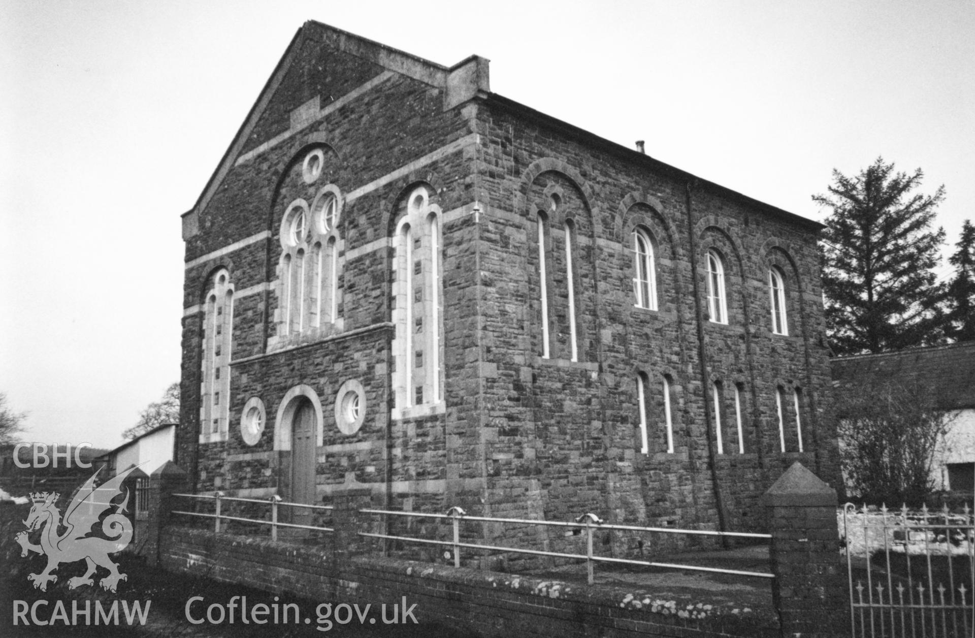 Digital copy of a black and white photograph showing an exterior view of Ebeneser Welsh Independent Chapel, Llansadwrn, taken by Robert Scourfield, 1996.