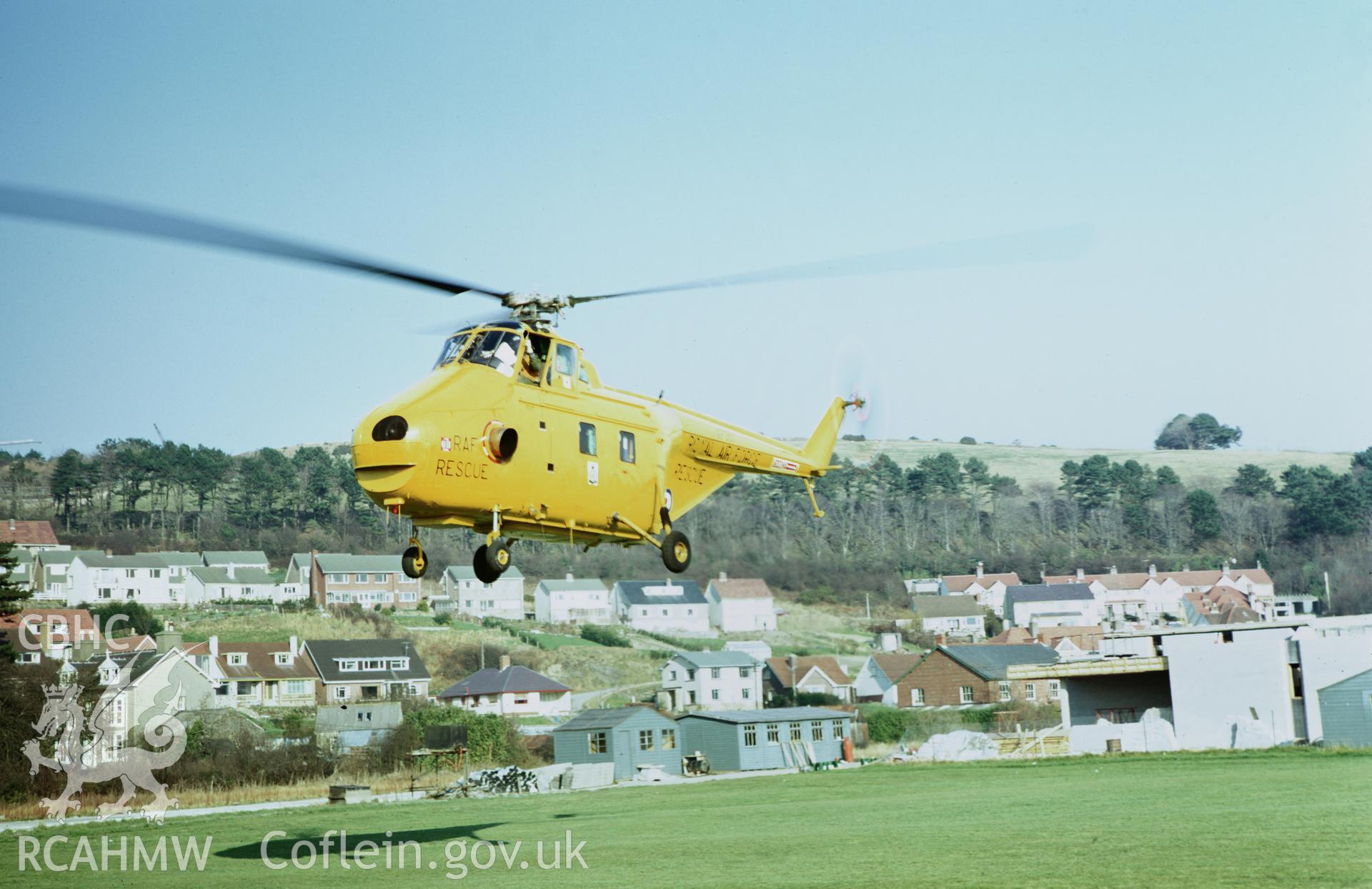35mm colour slide showing an emergency services helicopter at Llanbadarn Fawr, Aberystwyth by Dylan Roberts.