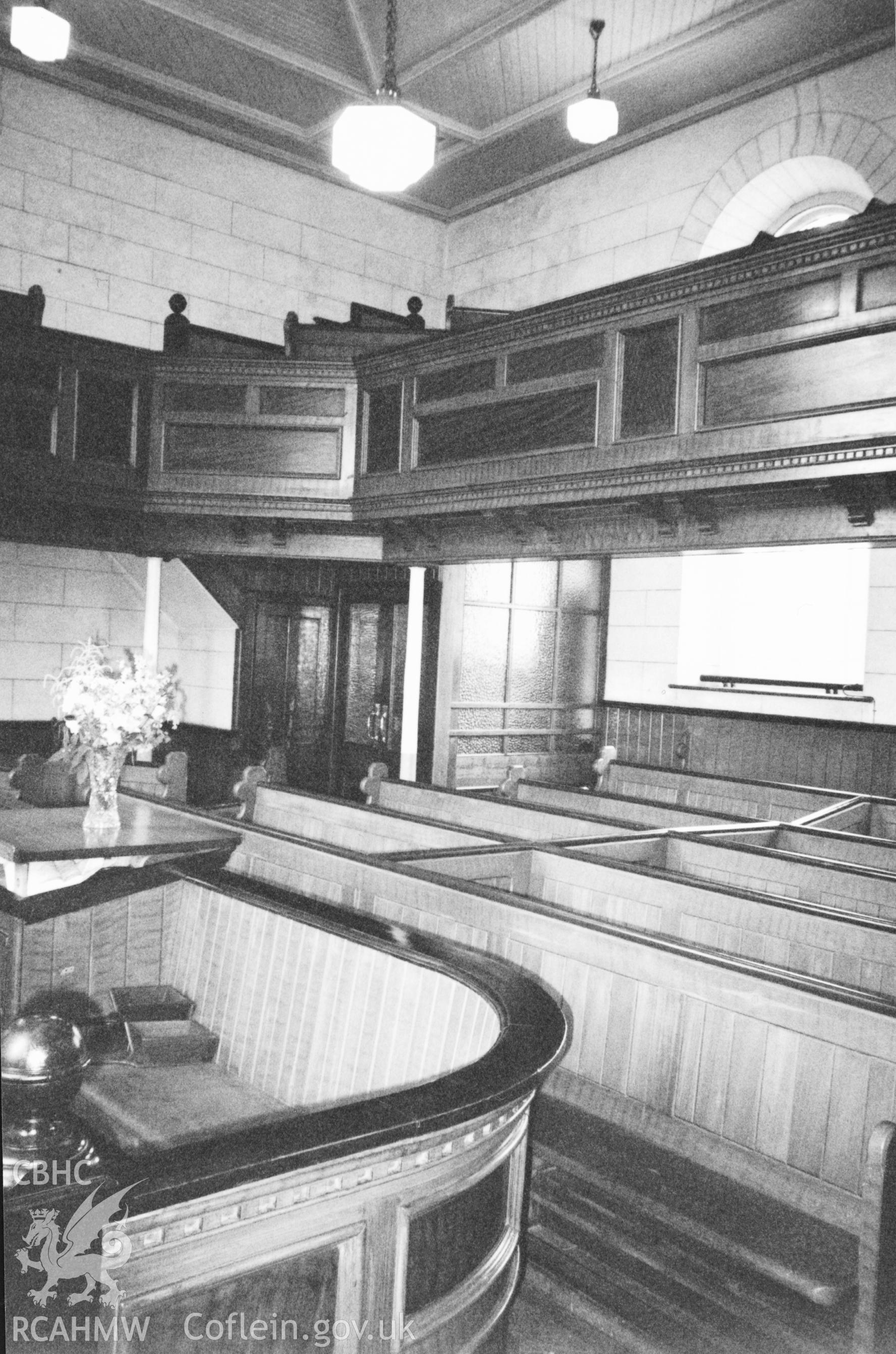 Digital copy of a black and white photograph showing an interior view of Tabernacl Welsh Calvinistic Methodist Chapel, Llanddowror, taken by Robert Scourfield, 1996.