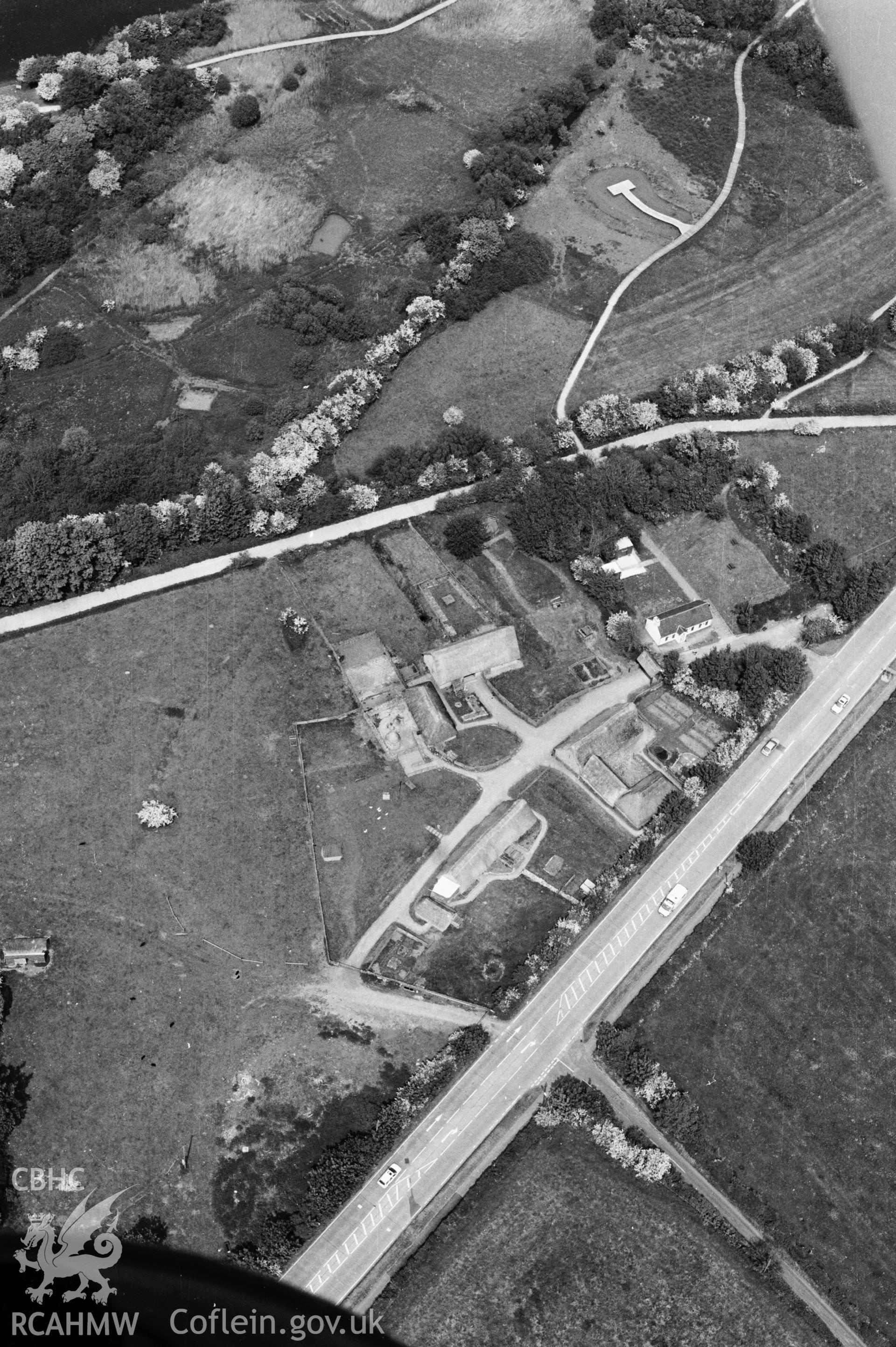 RCAHMW black and white oblique aerial photograph of Cosmeston, deserted medieval village. Taken by Toby Driver on 16/05/2002
