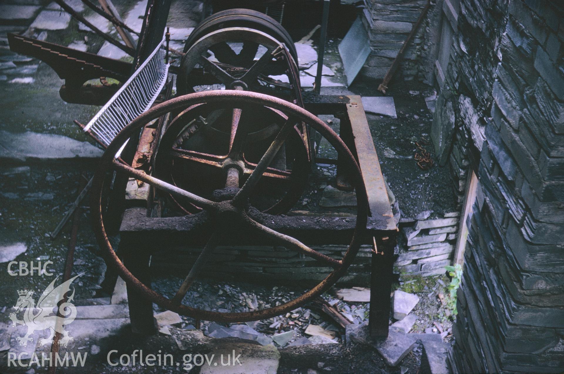 Colour 35mm slide of Oakley Slate, Quarry Blaenau Ffestiniog, showing slate cutting machine, by Dylan Roberts, undated.