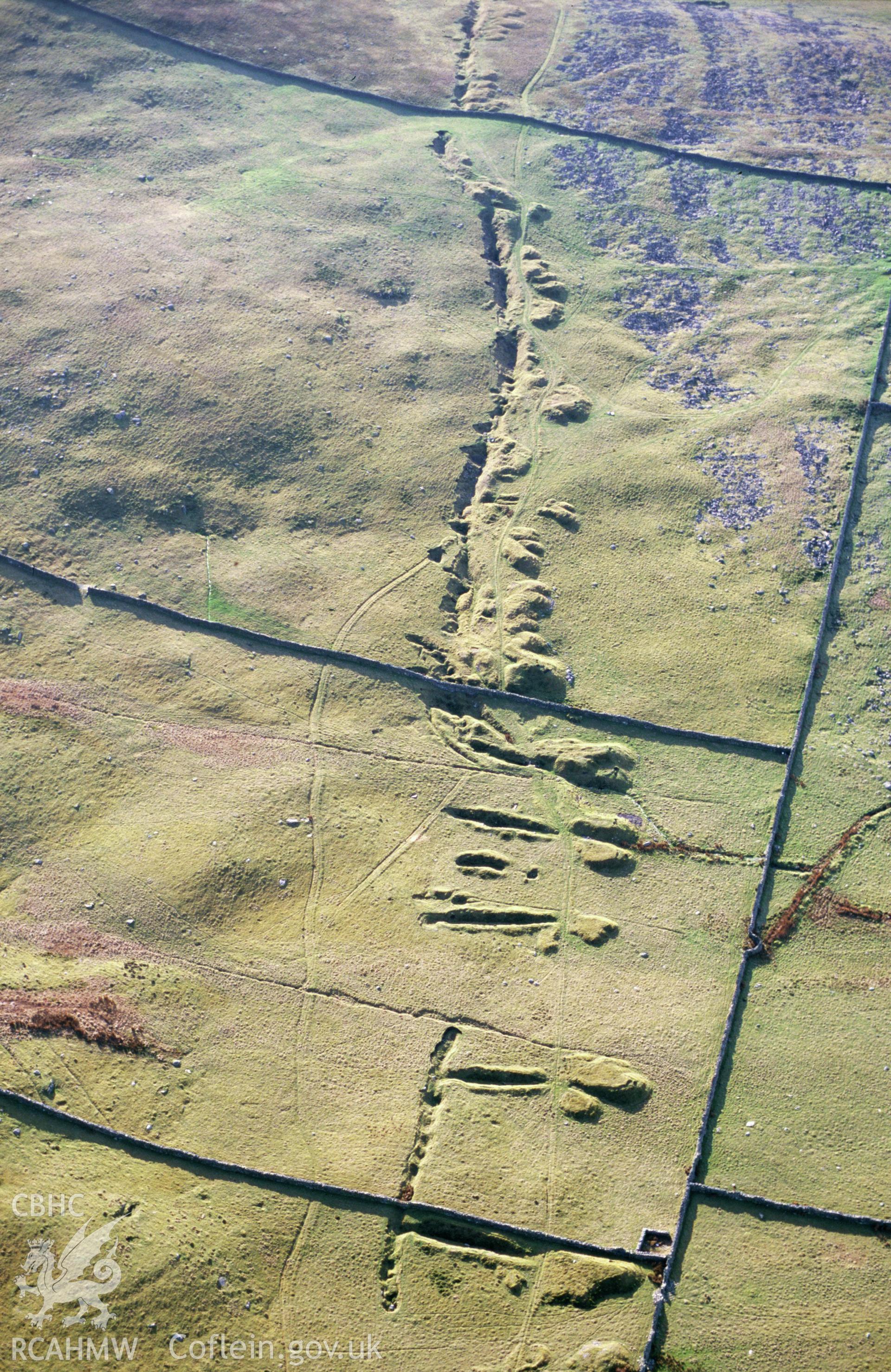 Slide of RCAHMW colour oblique aerial photograph of Hafotty Mines, Dyffryn Ardudwy taken by T.G. Driver, 2002.