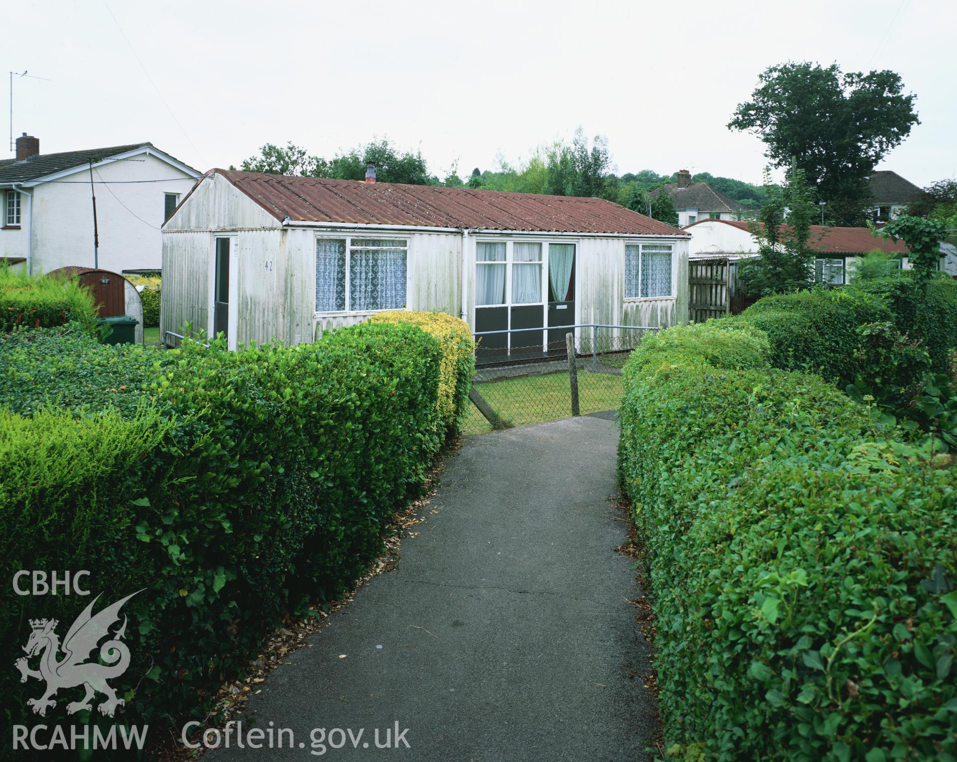 RCAHMW colour transparency showing exterior view of prefabricated buildings on the Bishpool Estate, Newport taken by I.N. Wright, September 2003.