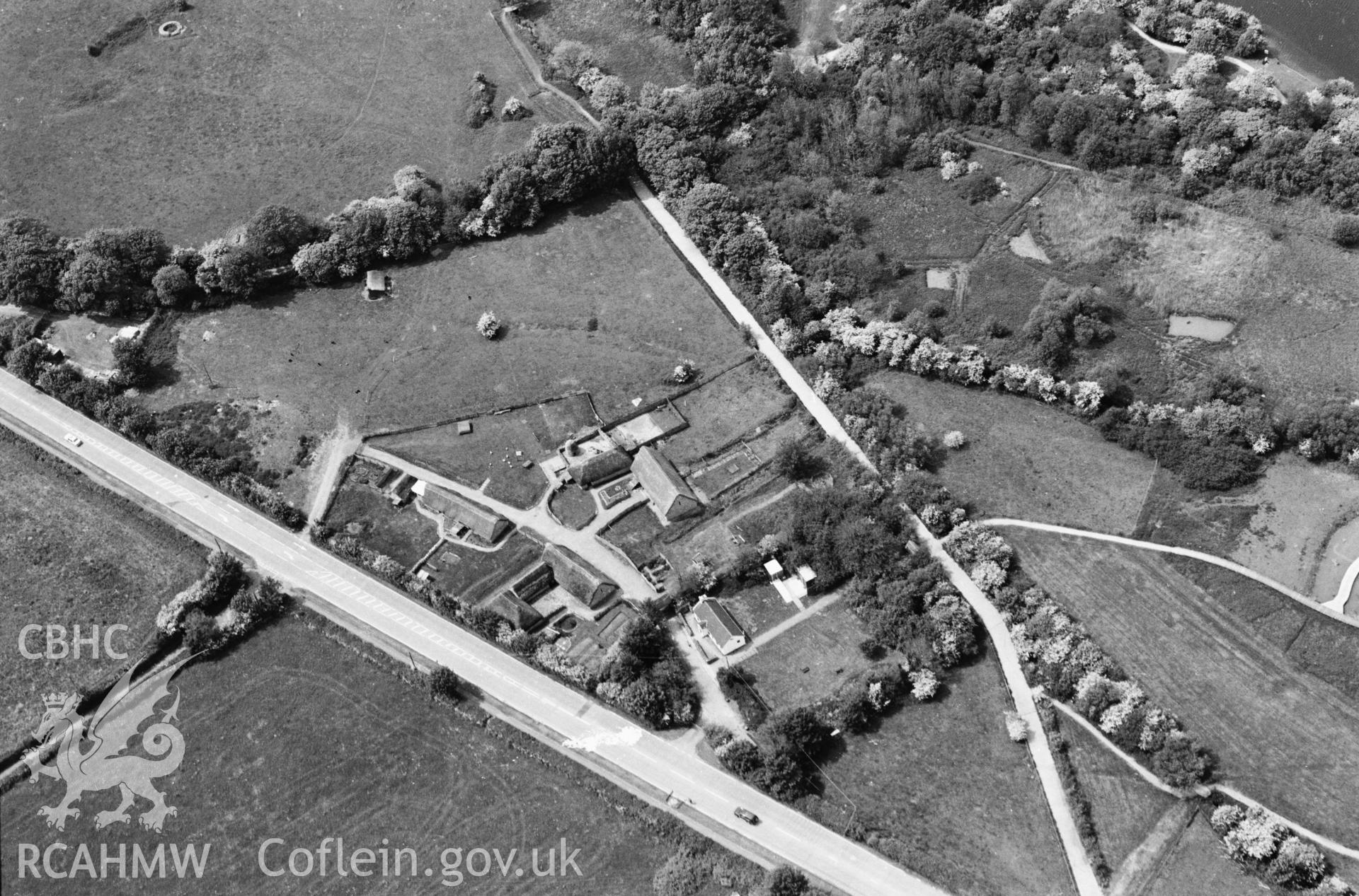 RCAHMW black and white oblique aerial photograph of Cosmeston, deserted medieval village. Taken by Toby Driver on 16/05/2002