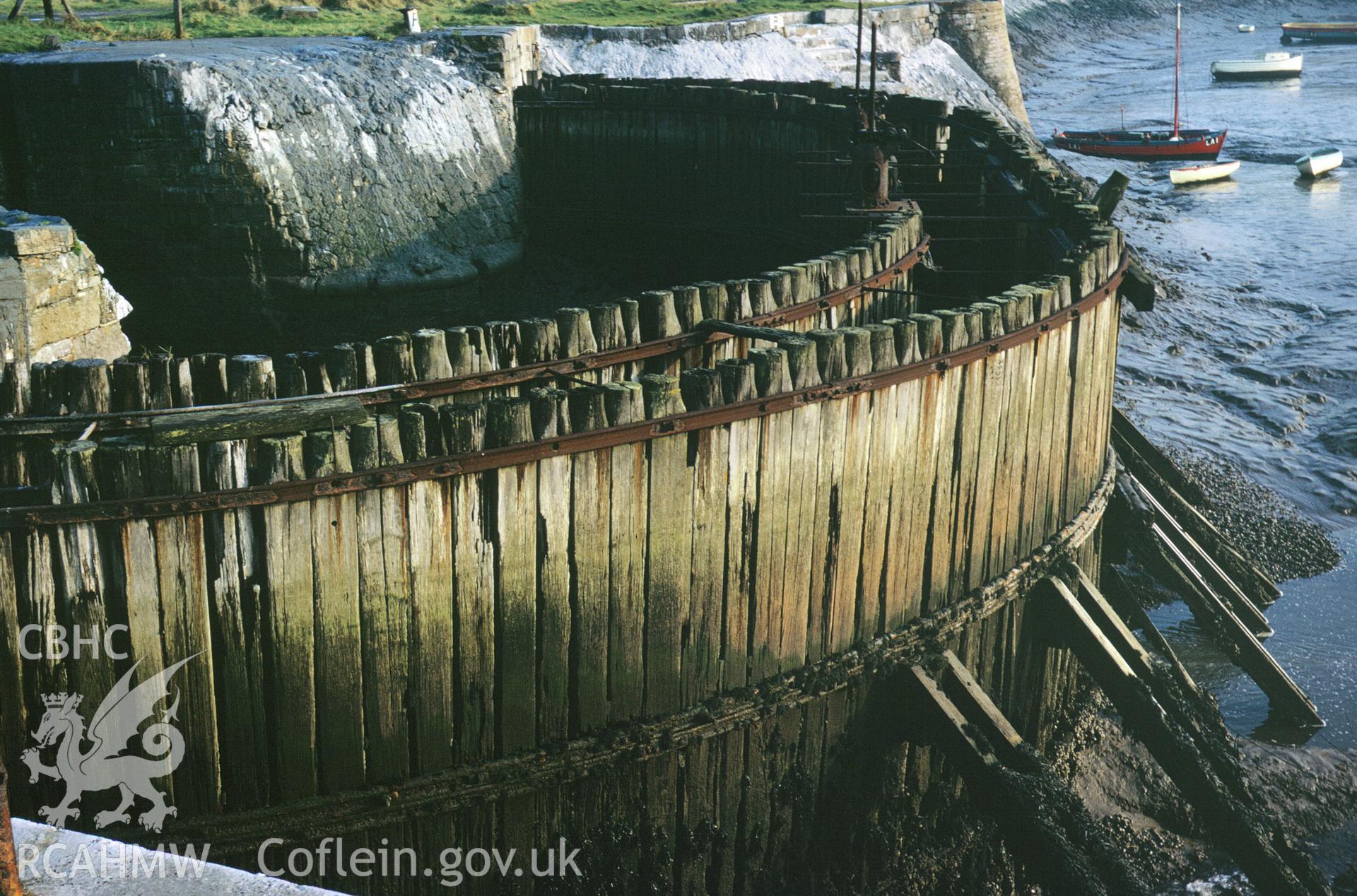 35mm colour slide showing coffer dam at Burry Port Harbour, by Dylan Roberts.