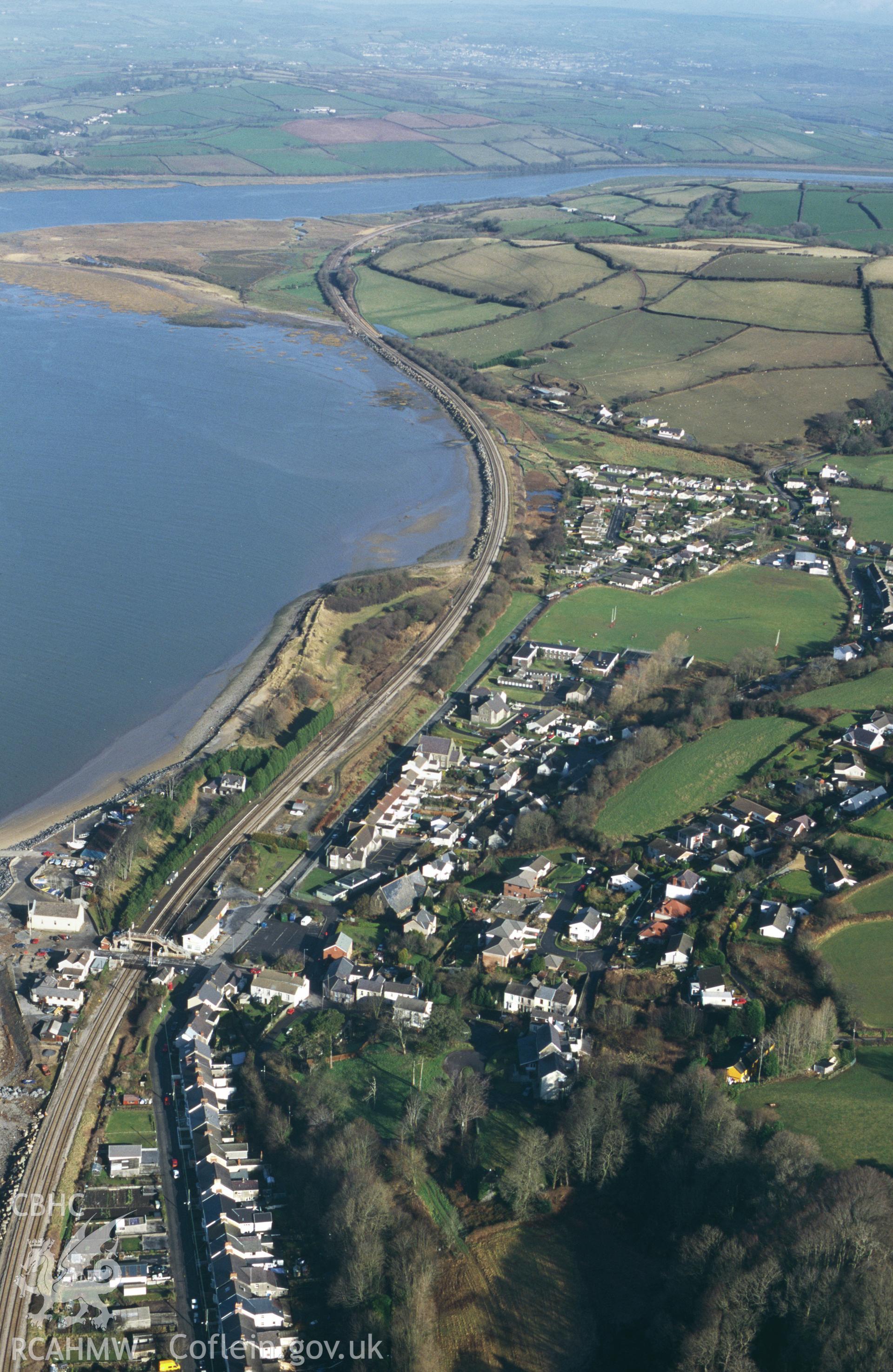 Slide of RCAHMW colour oblique aerial photograph of Ferryside, taken by C.R. Musson, 15/2/1997.