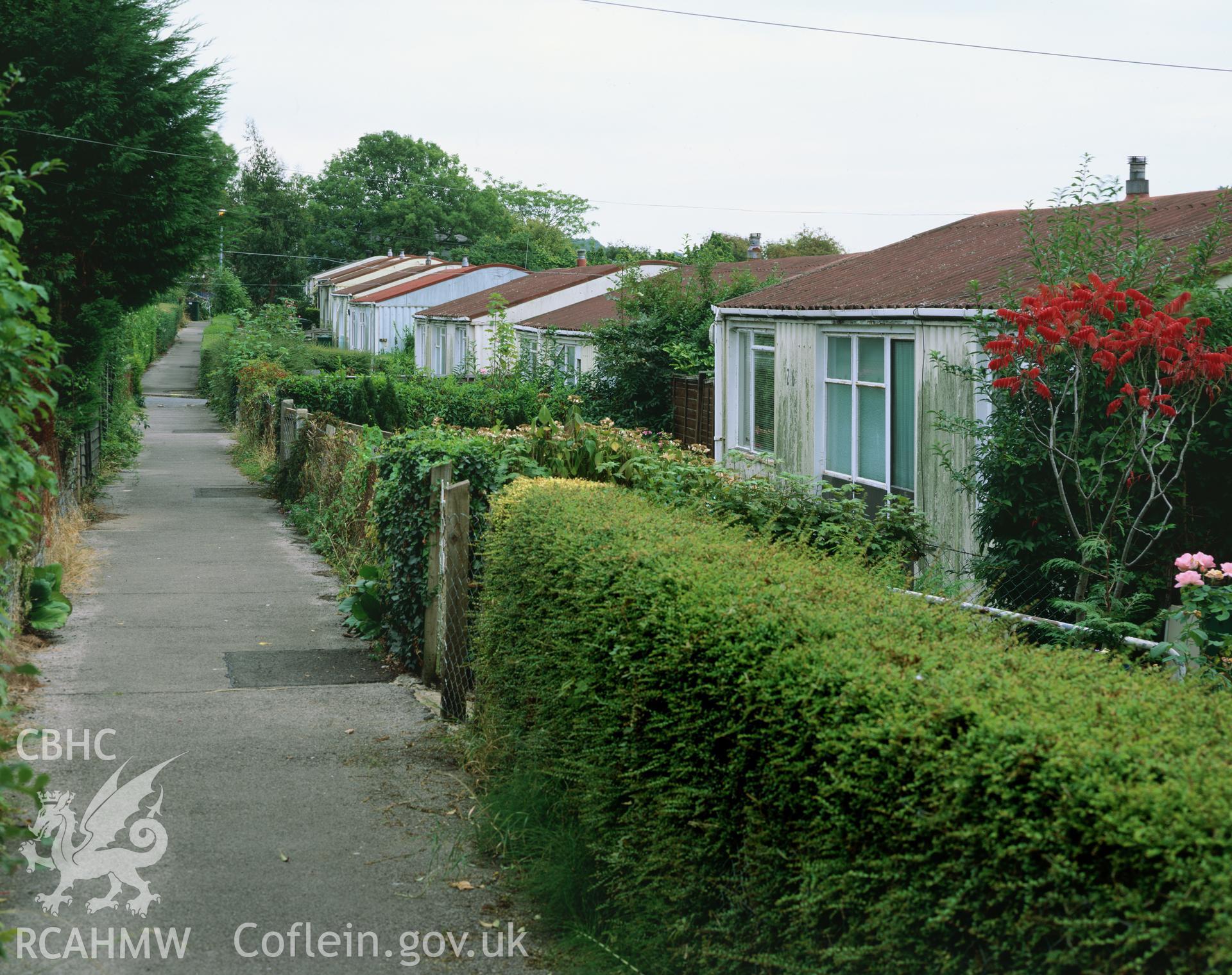 RCAHMW colour transparency showing exterior view of prefabricated buildings on the Bishpool Estate, Newport taken by I.N. Wright, September 2003.
