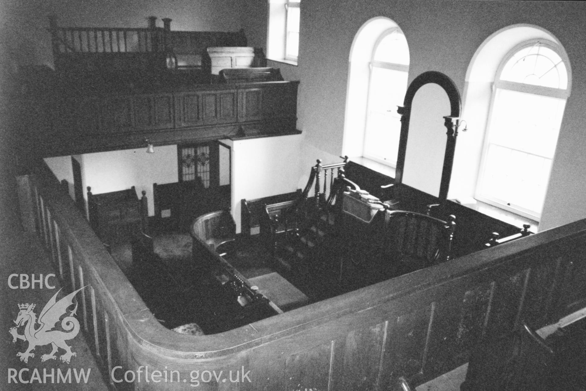 Digital copy of a black and white photograph showing an interior view of Capel y Graig Welsh Calvinistic Methodist Chapel, Cwmbach, taken by Robert Scourfield, 1996.