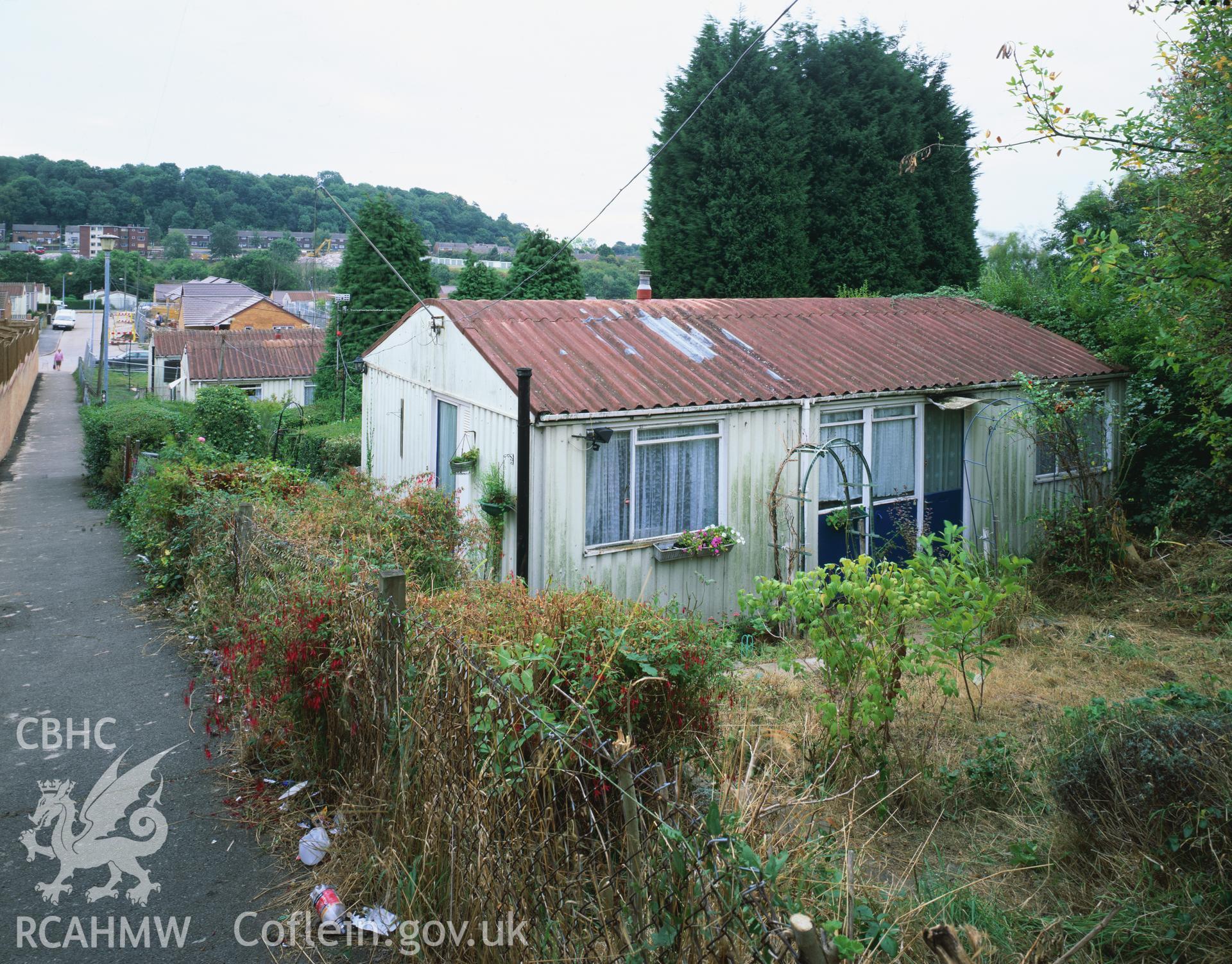 RCAHMW colour transparency showing exterior view of prefabricated buildings on the Bishpool Estate, Newport taken by I.N. Wright, September 2003.