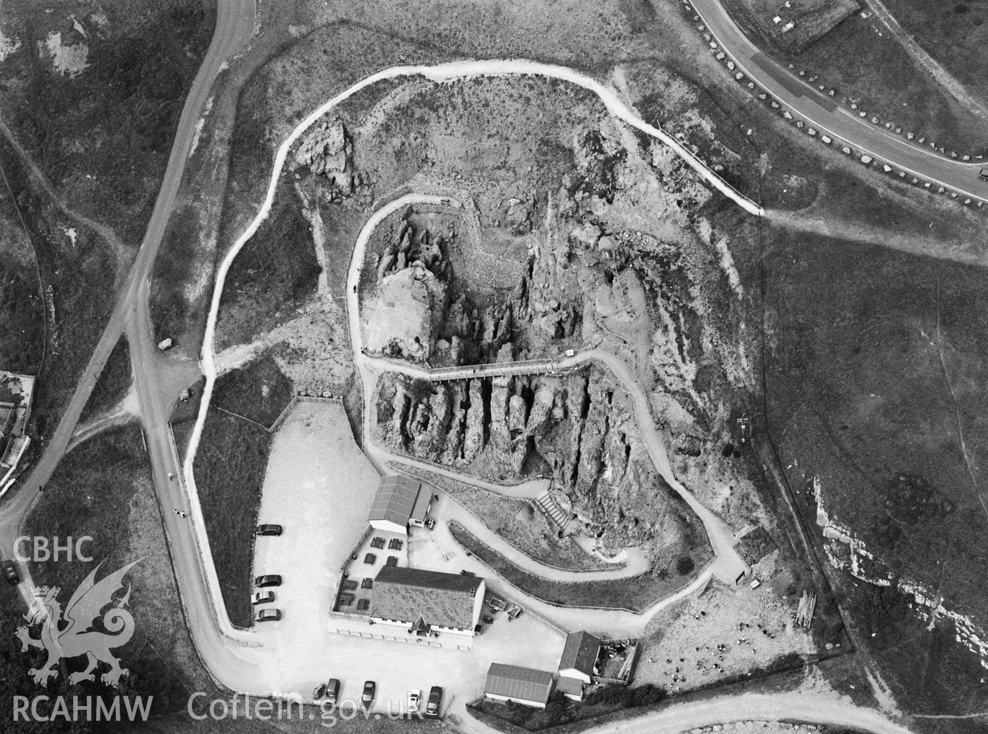 RCAHMW black and white oblique aerial photograph of Great Orme mine, near-vertical view of workings and visitor centre. Taken by Toby Driver on 15/07/2003