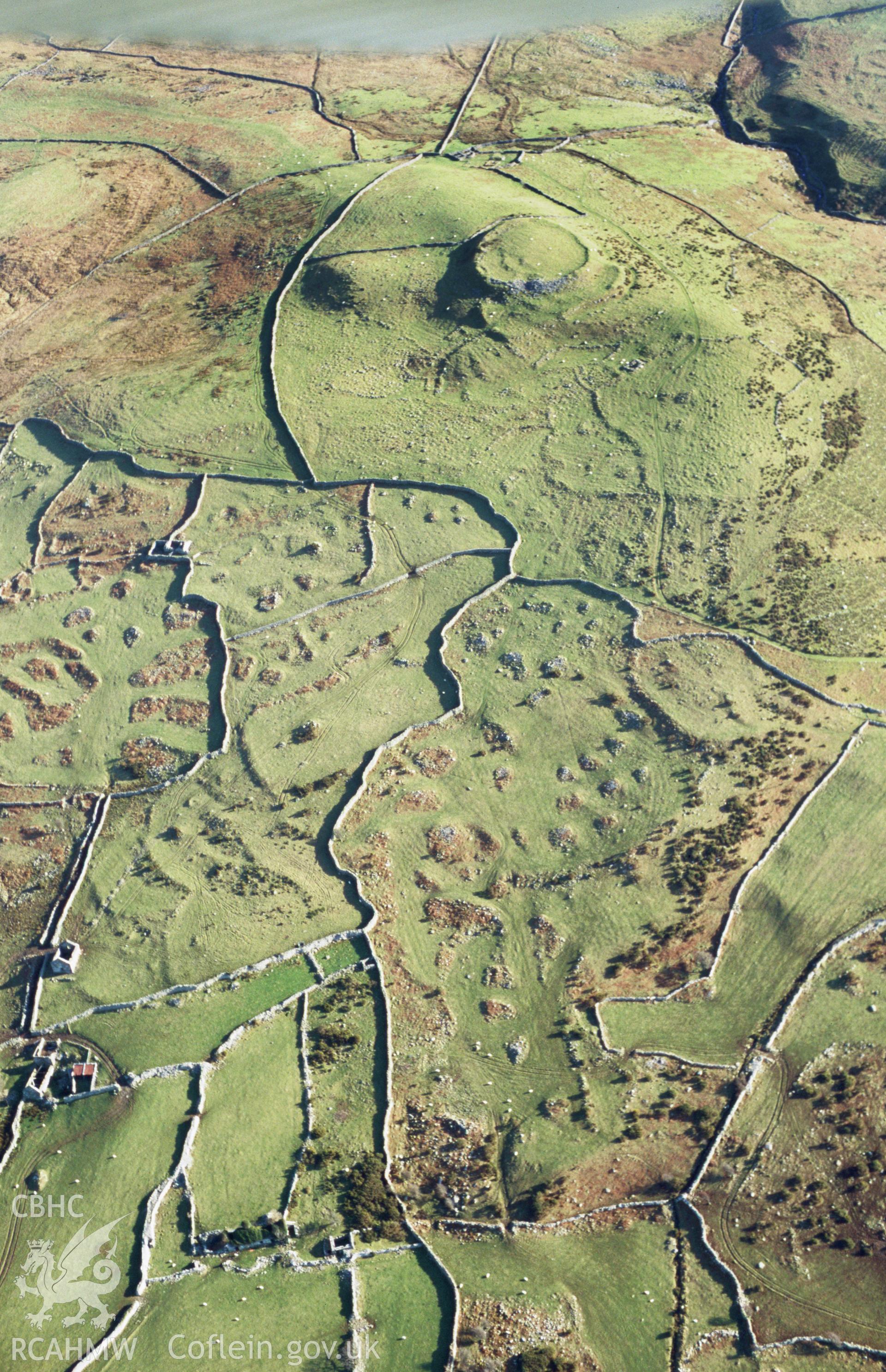 Slide of RCAHMW colour oblique aerial photograph of Pen y Dinas, Dyffryn Ardudwy, taken by T.G. Driver, 2005.