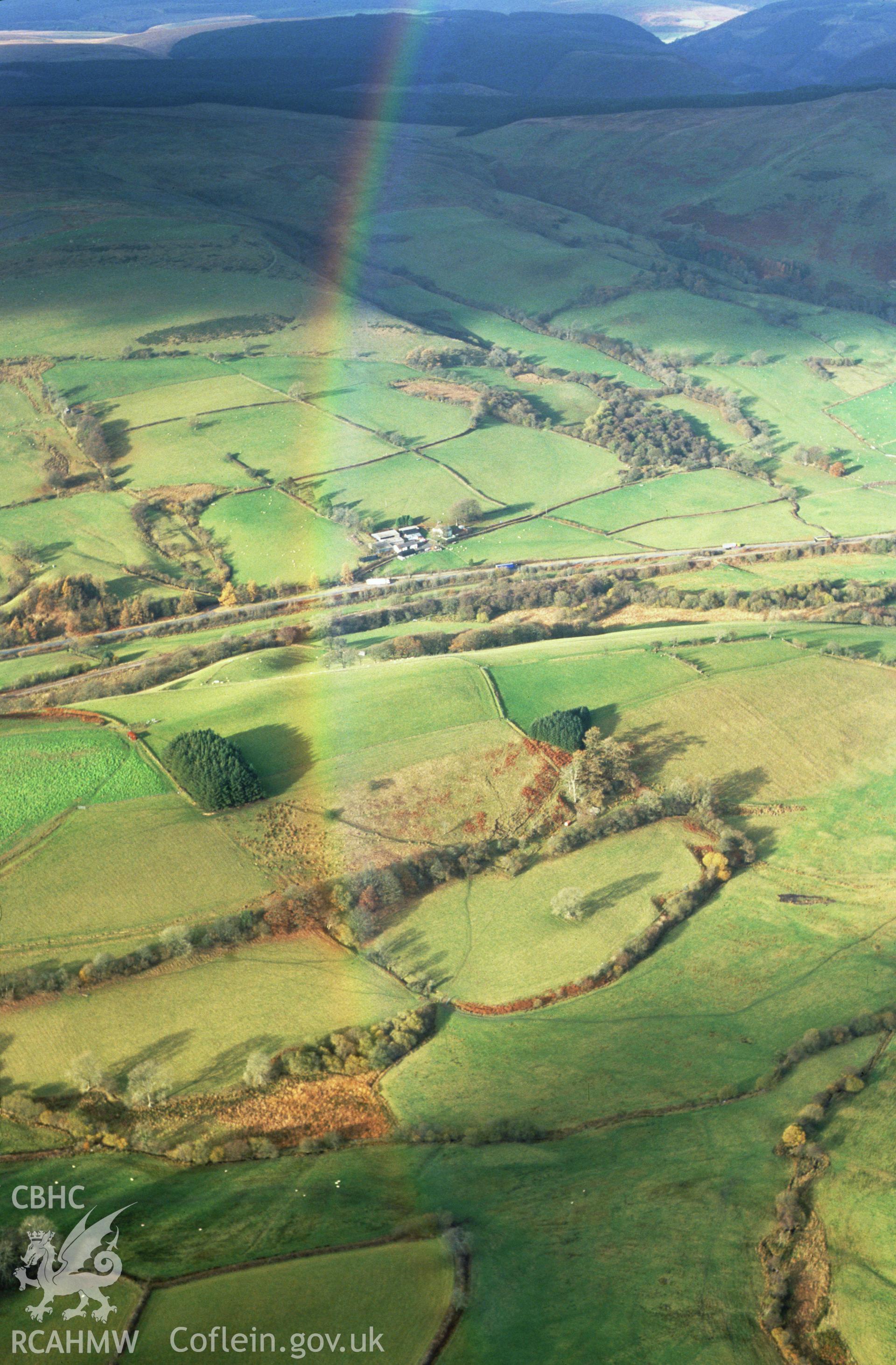 Slide of RCAHMW colour oblique aerial photograph of rainbow at Llanwrtyd Wells, taken by T.G. Driver, 2003.