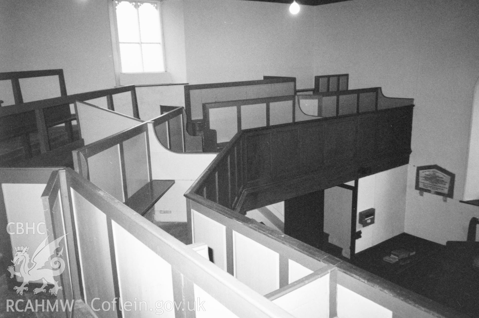 Digital copy of a black and white photograph showing an interior view of Caerfarchell Calvinistic Mehodist Chapel, St Davids, taken by Robert Scourfield, 1996.