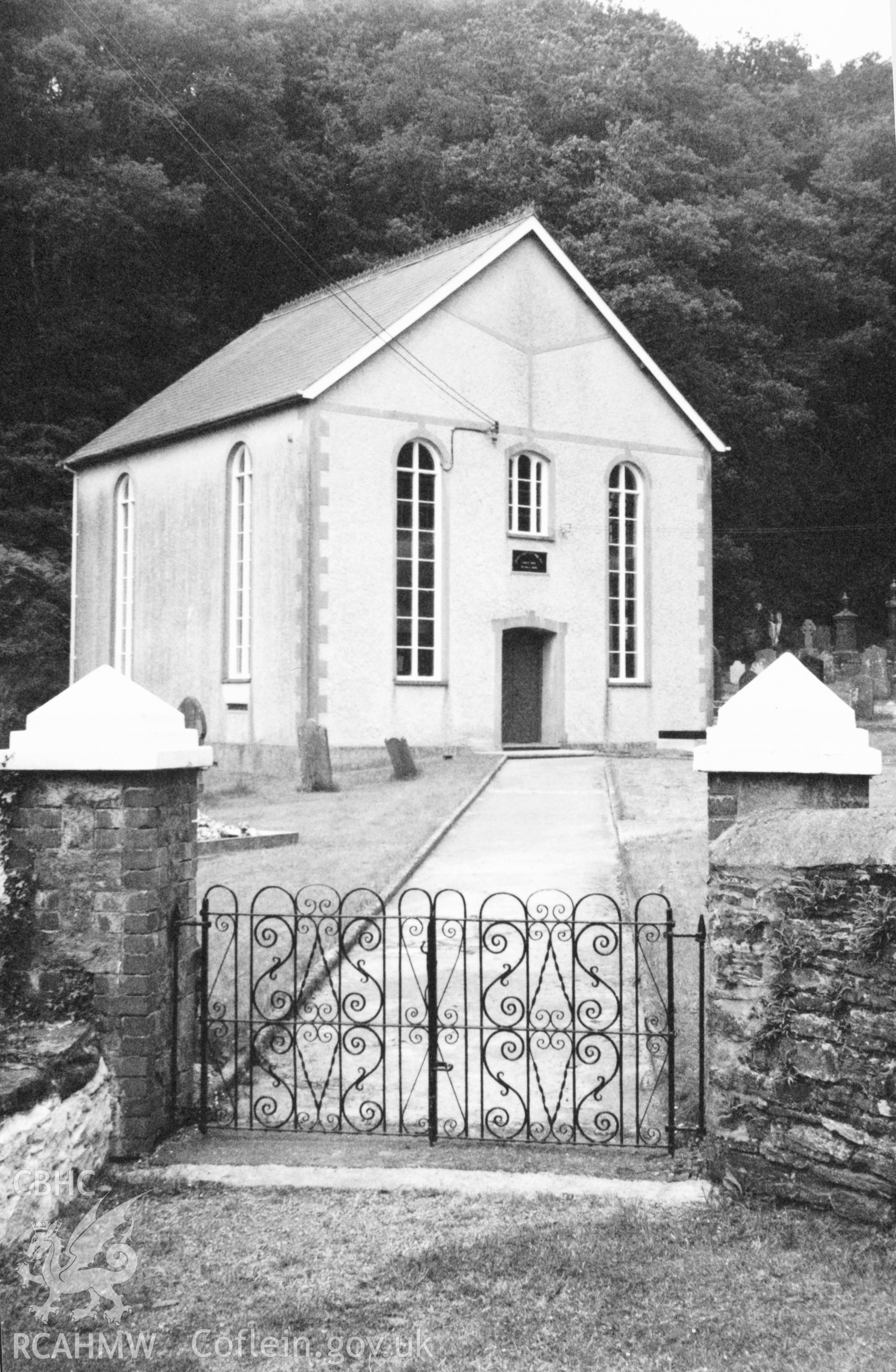 Digital copy of a black and white photograph showing an exterior view of Ainon Welsh Baptist Chapel, Gelli-wen, taken by Robert Scourfield, 1996.