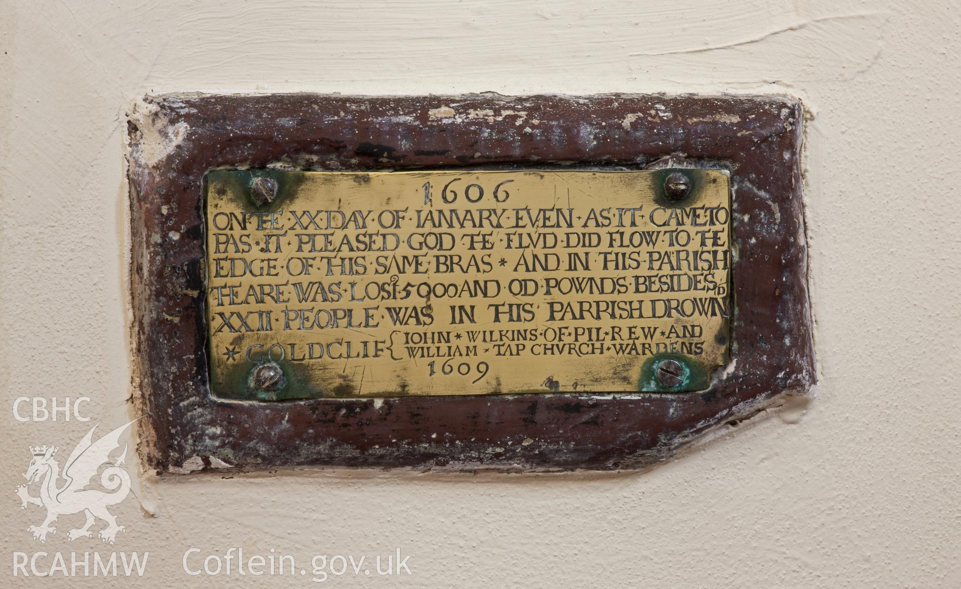 1606 brass plate commemorating the flood.