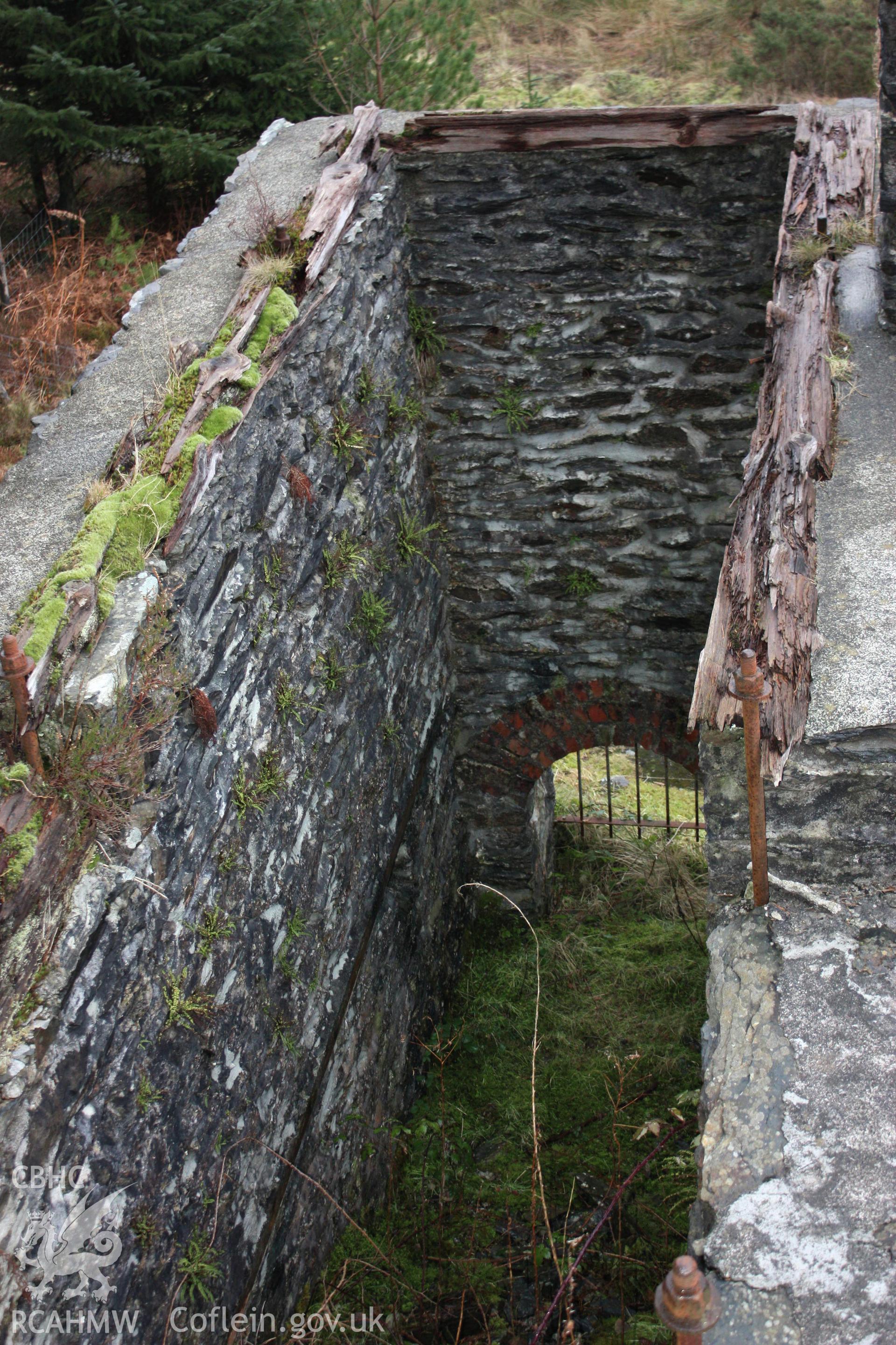 Ystrad Einion metal mine.  Looking north-east into wheel pit 2.