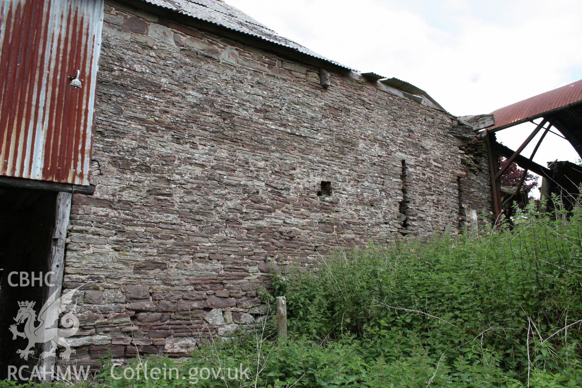 South-west elevation of barn range showing ventilation slits.
