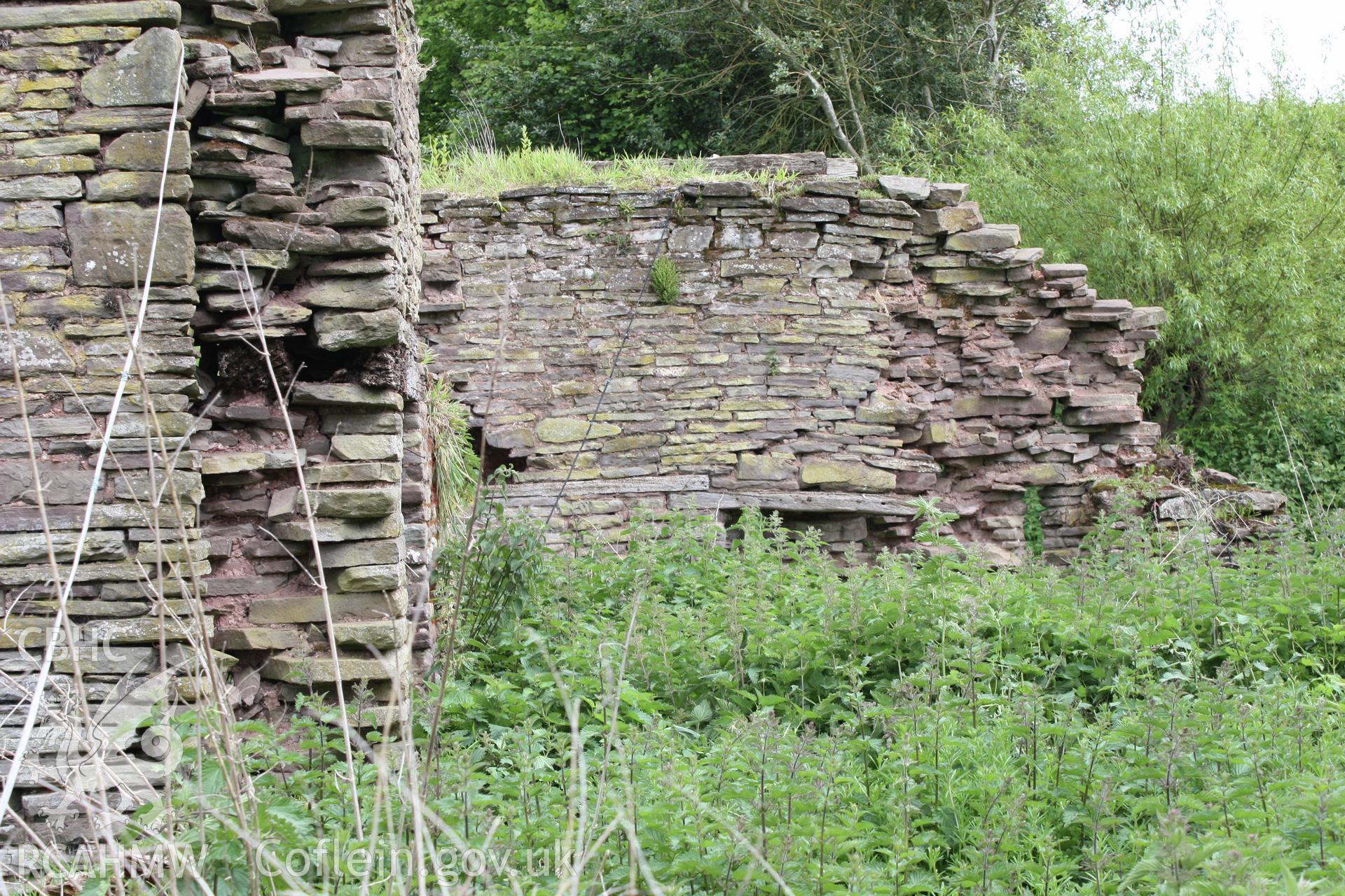 Interior of Barn range showing the rebate for the upper end cruck truss on the North side.