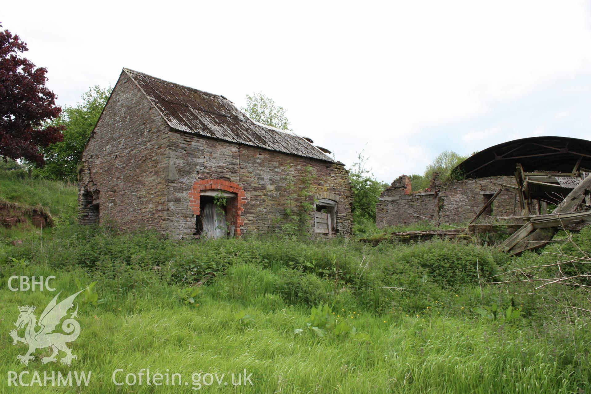 3/4 view from north-west showing stable in foreground.