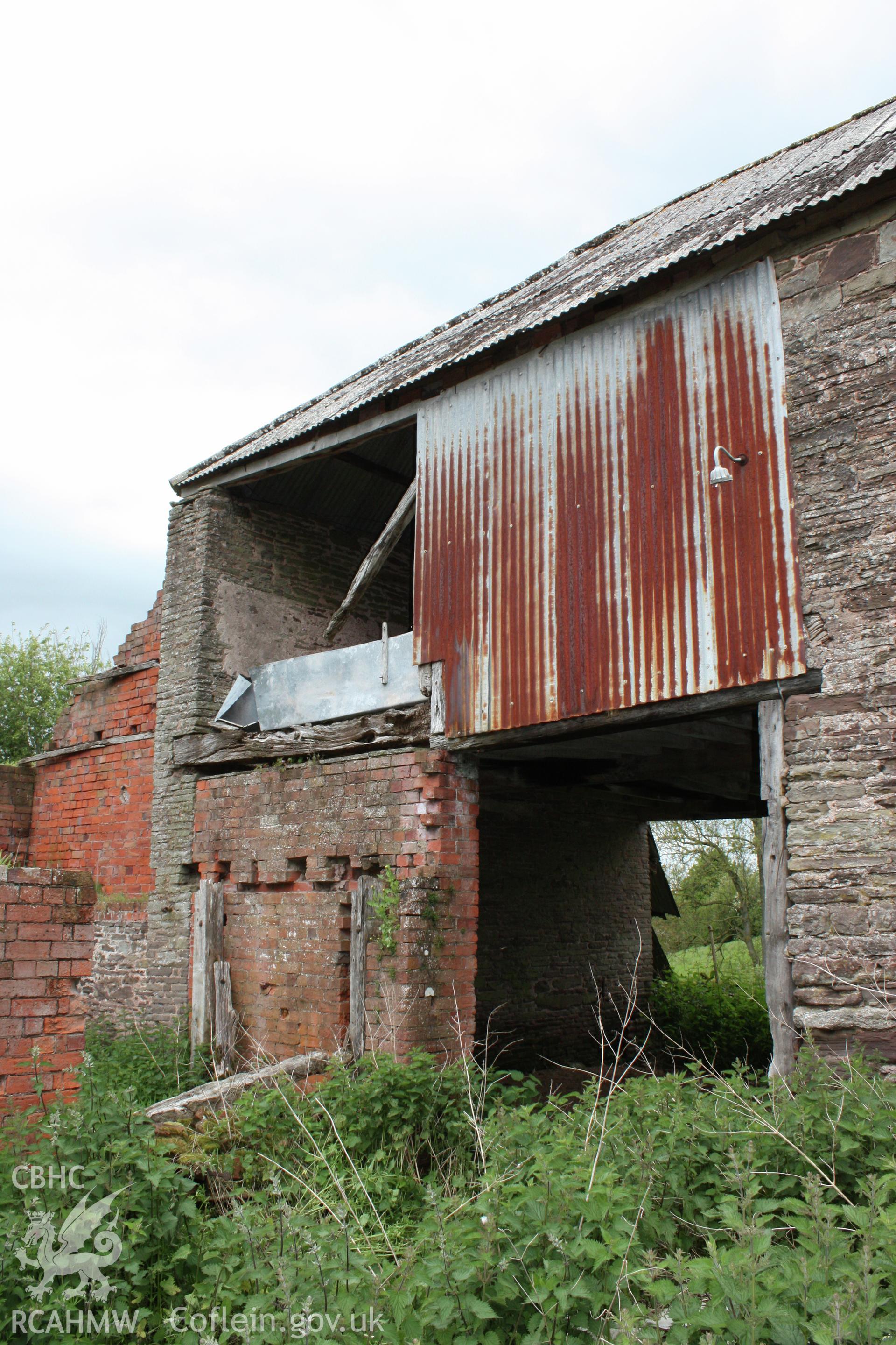 South-west elevation of barn range at granary over cart-house.