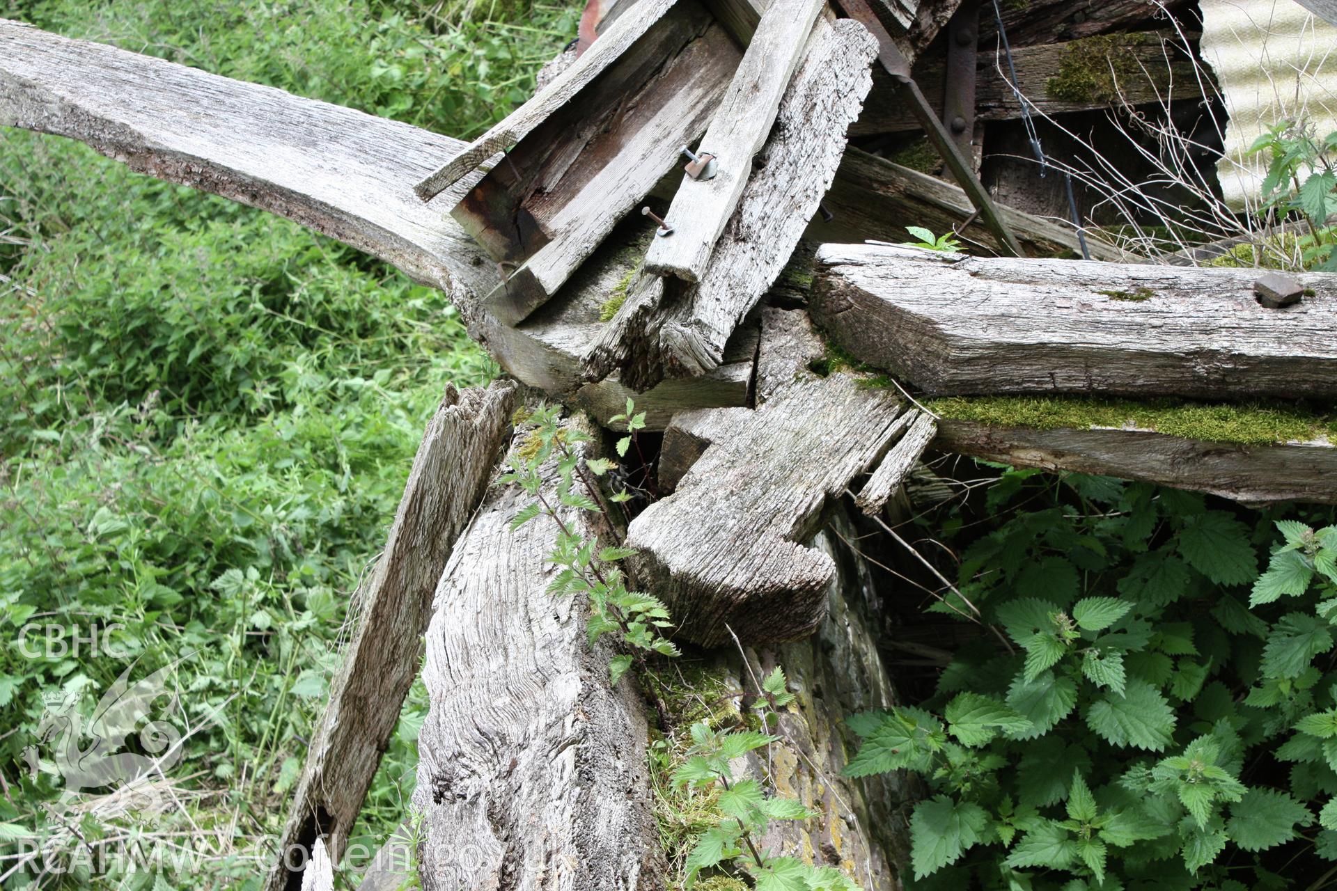 Interior of Barn range showing the lopen cruck truss with spur to wall-plate.