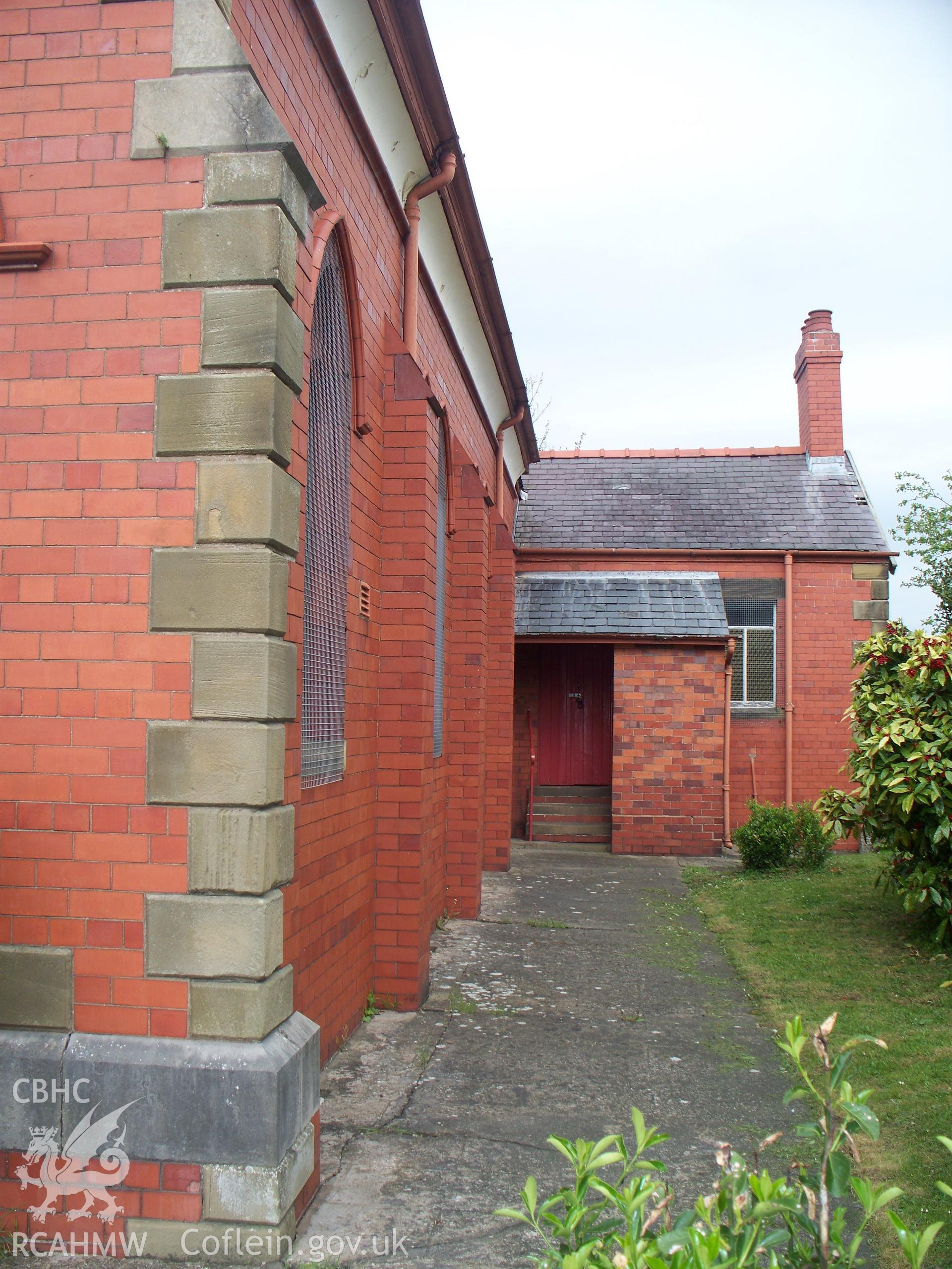 Right-hand wall detail and entrance to Sunday school.