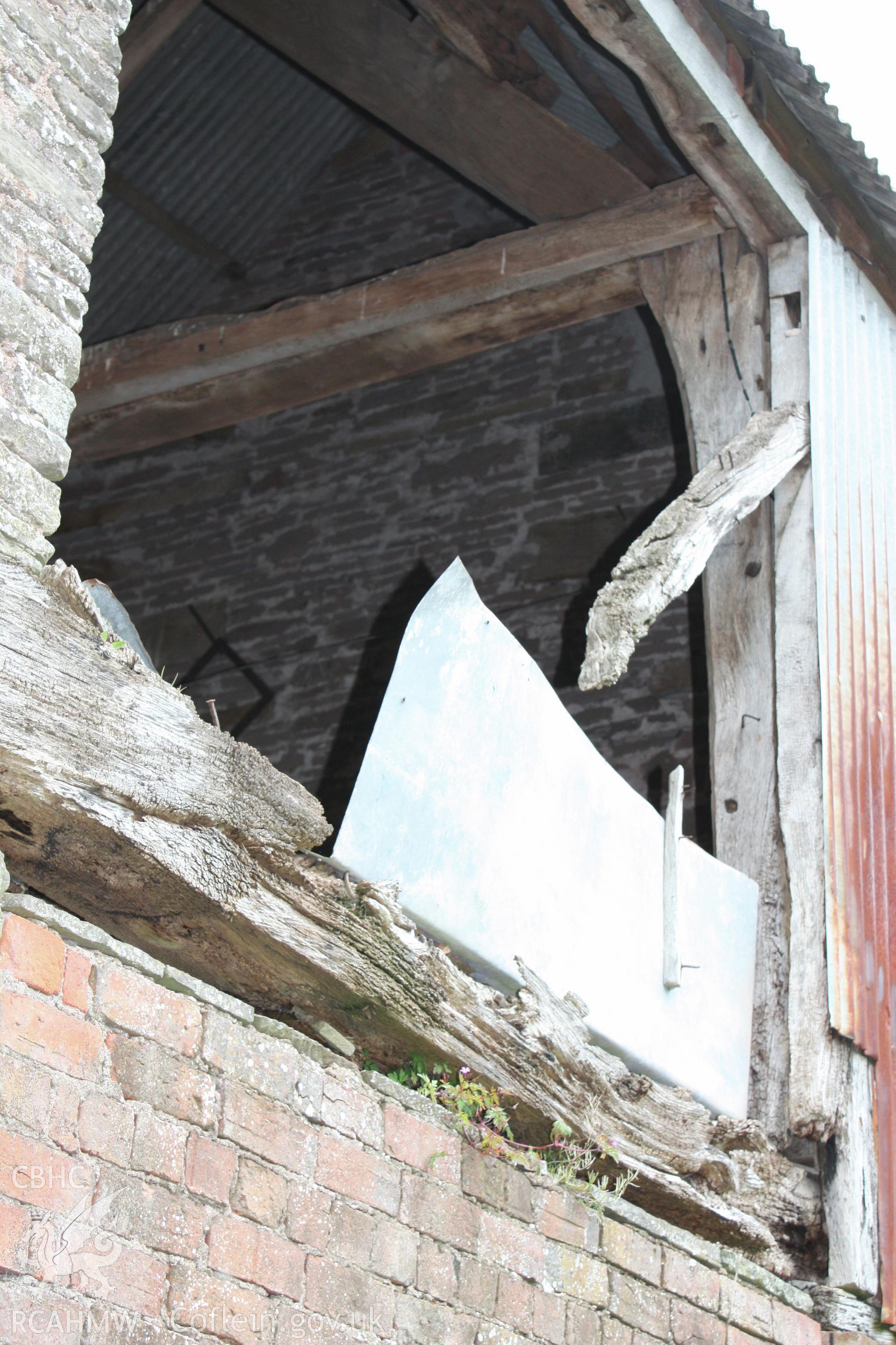 Barn range, cart-house showing granary roof-truss.