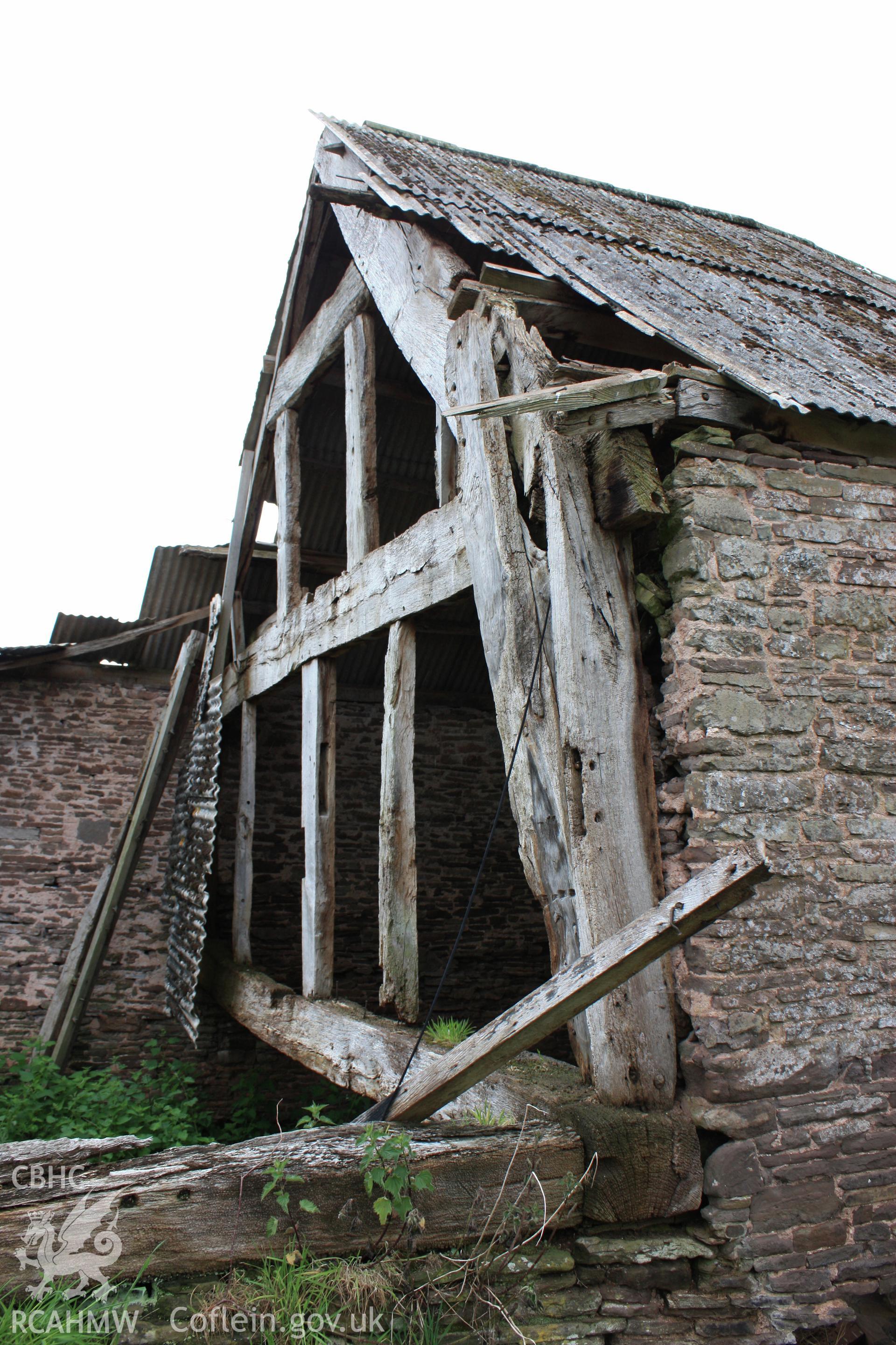 Interior of Barn range showing the lower end cruck truss.