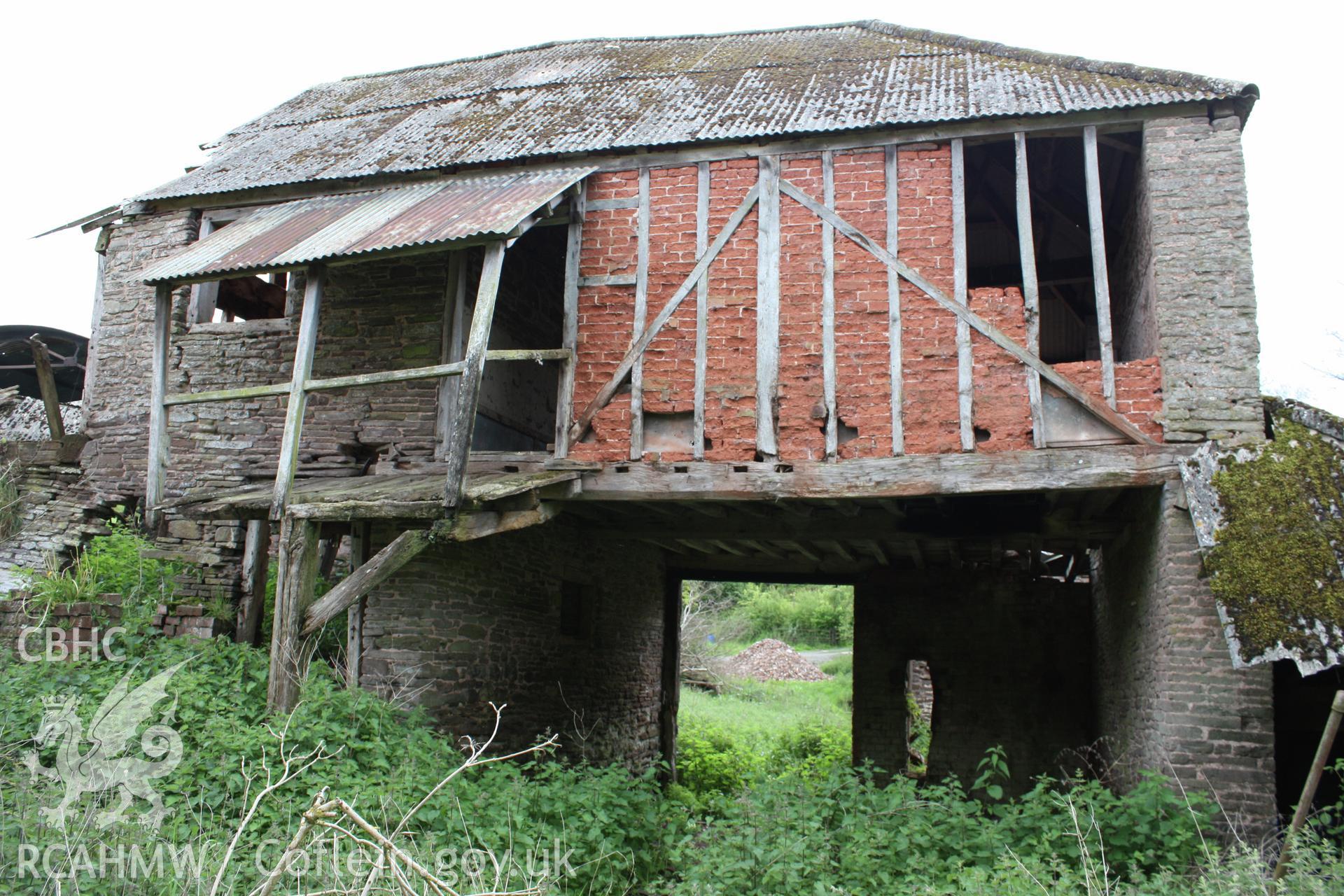 North-east elevation of barn range & granary with cart-house.